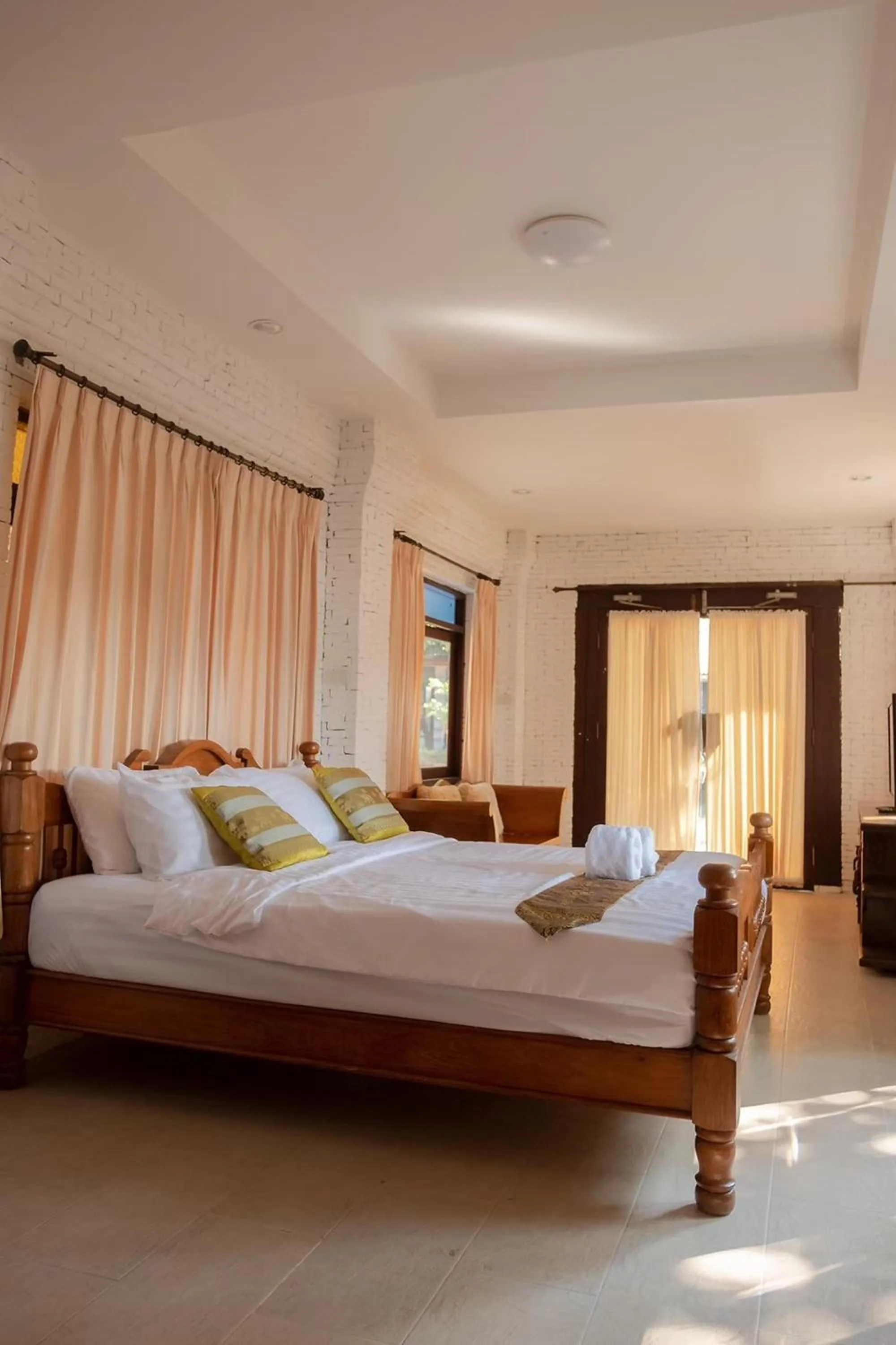 Bed in Baan Tawai Lanna Resort