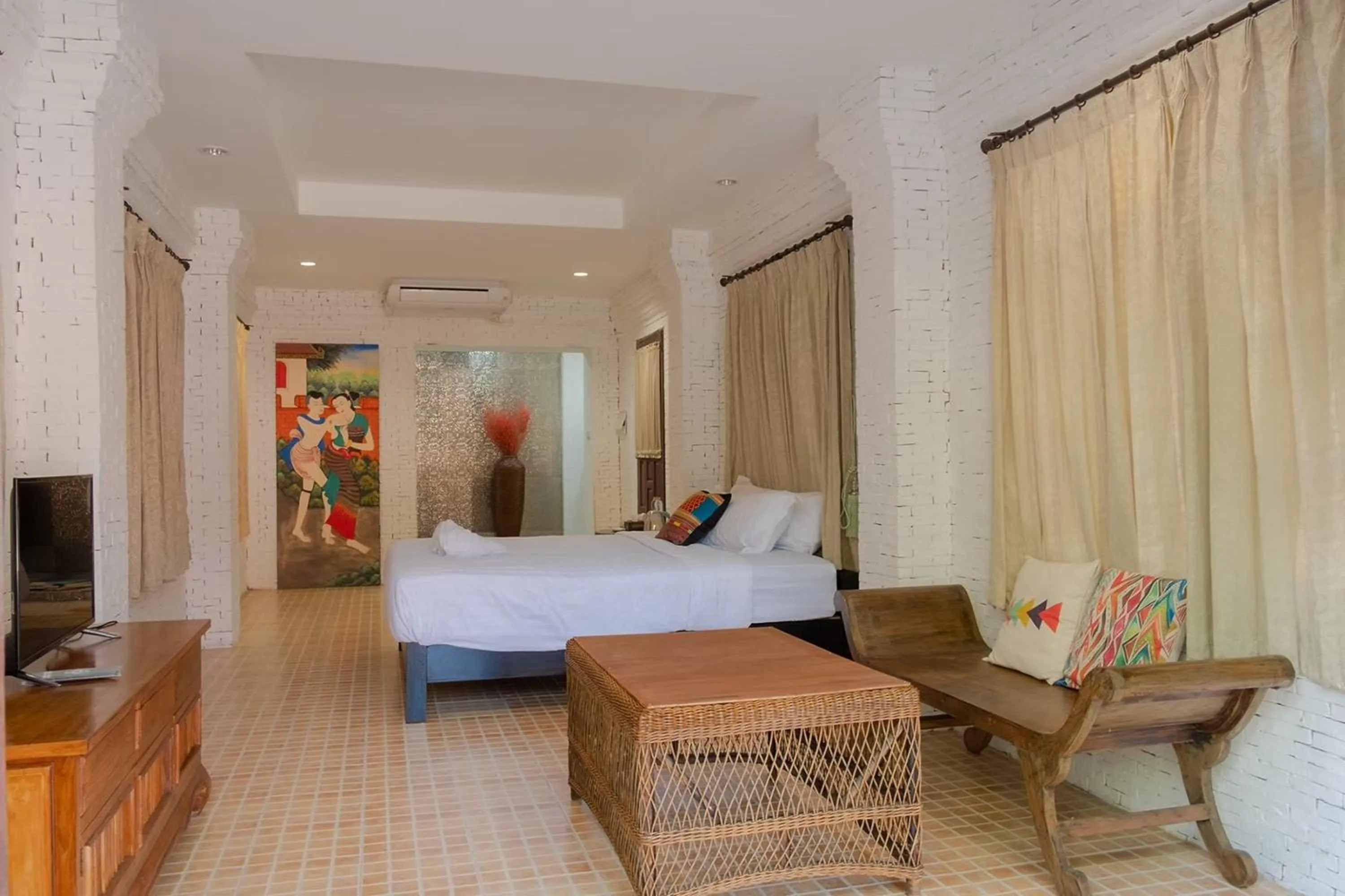 Bed in Baan Tawai Lanna Resort