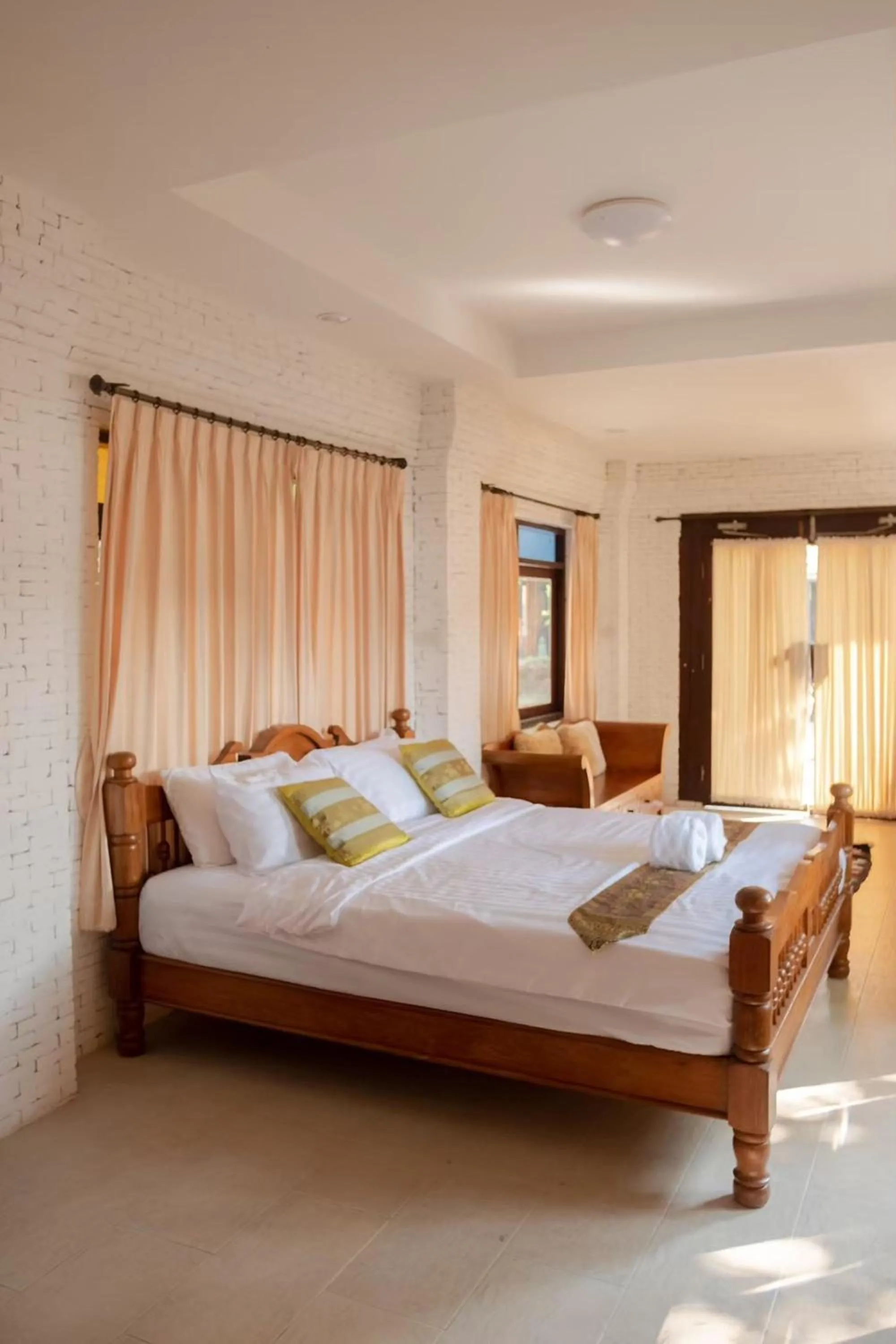 Bed in Baan Tawai Lanna Resort