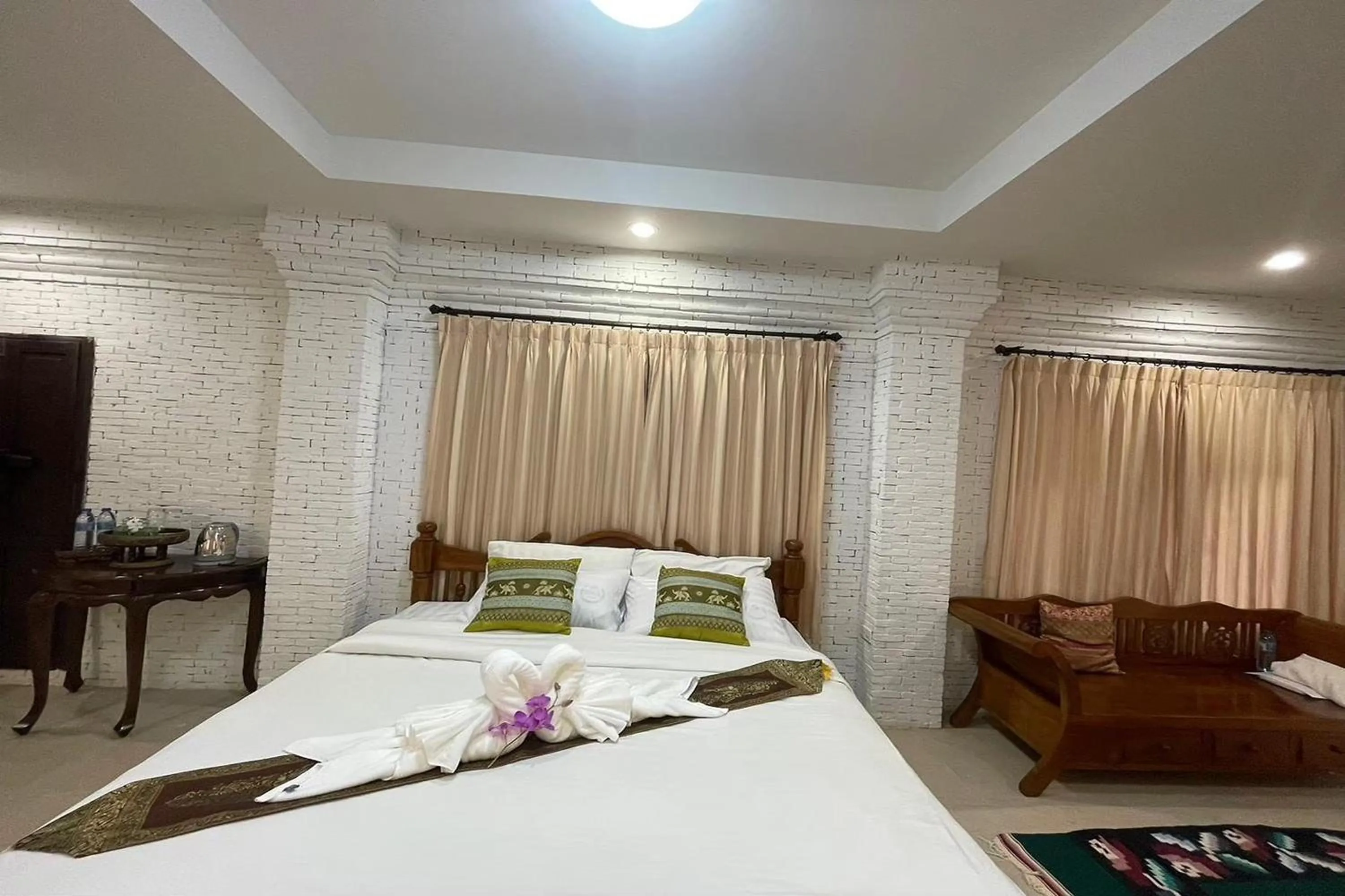 Bed in Baan Tawai Lanna Resort