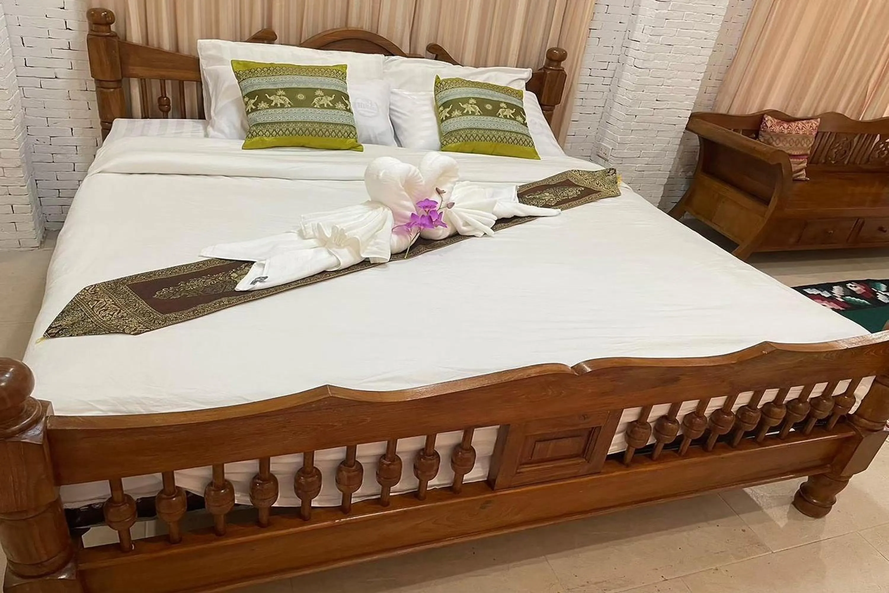 Bed in Baan Tawai Lanna Resort