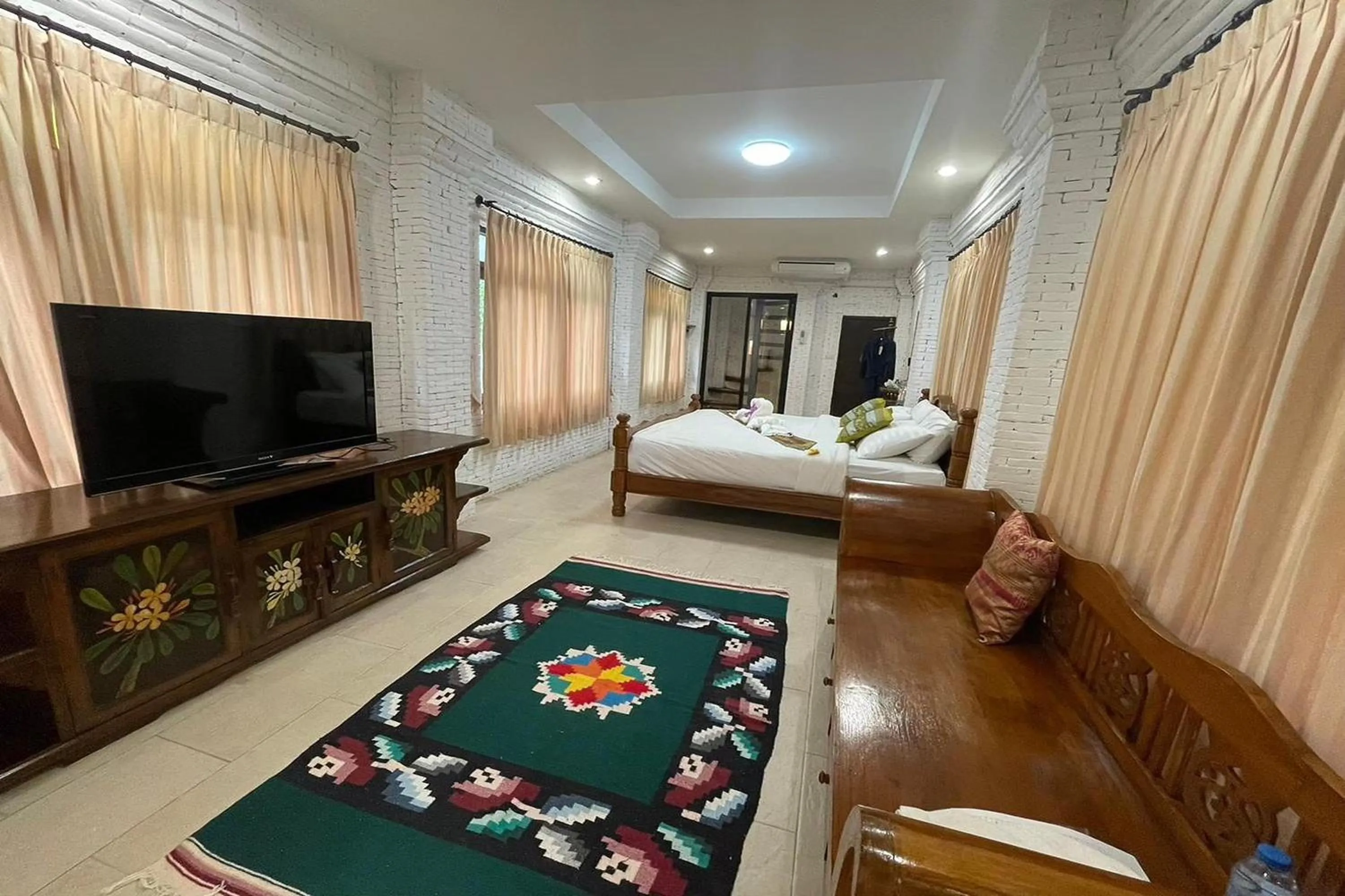 Bed in Baan Tawai Lanna Resort