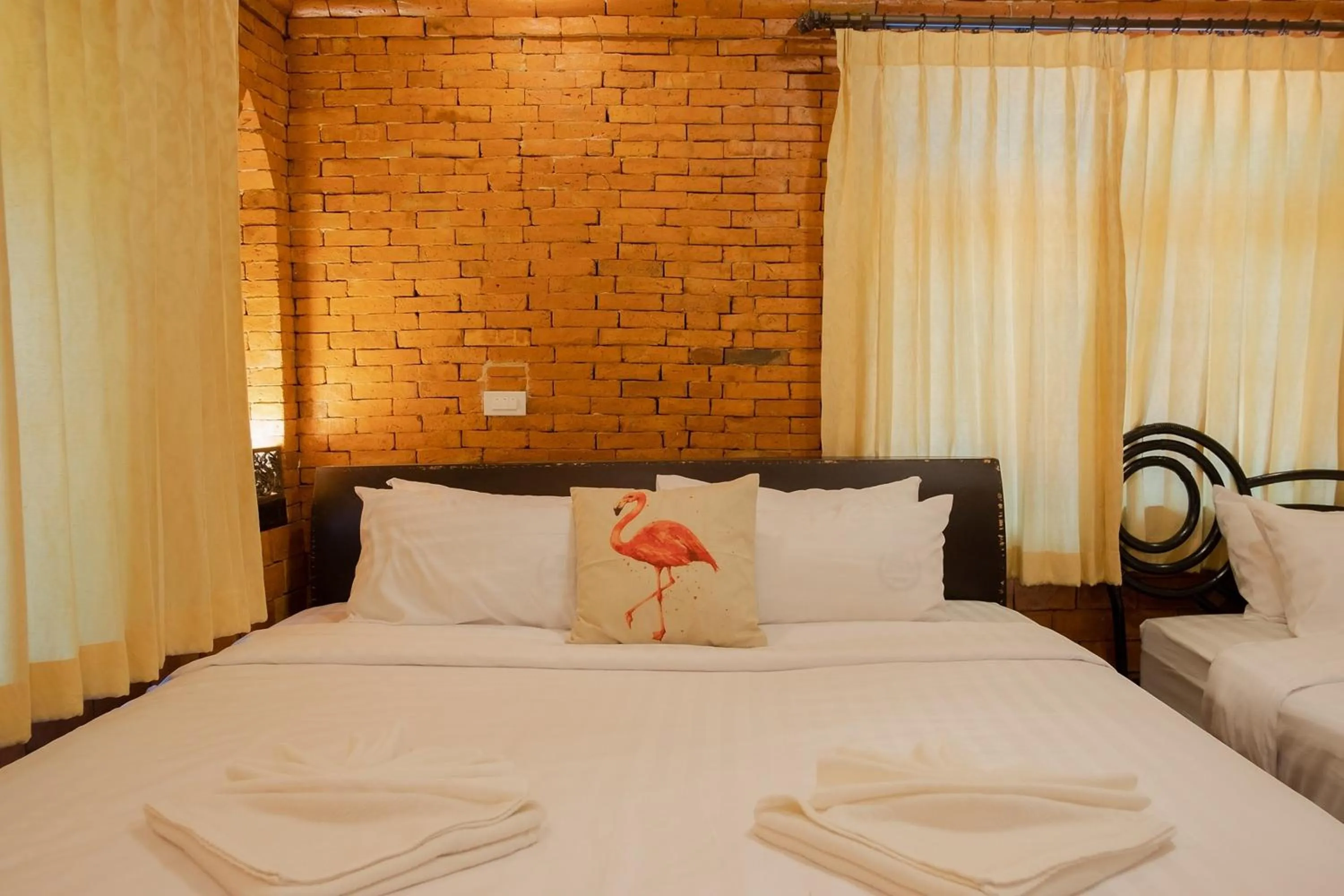 Bed in Baan Tawai Lanna Resort