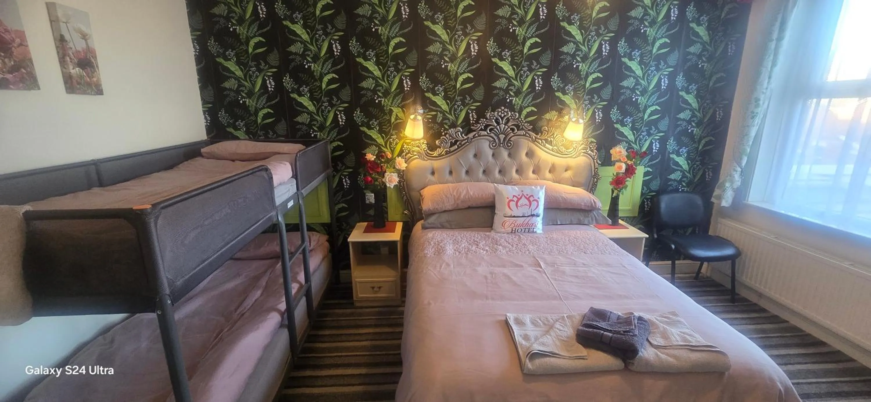 Bed in BUKHARI Hotel