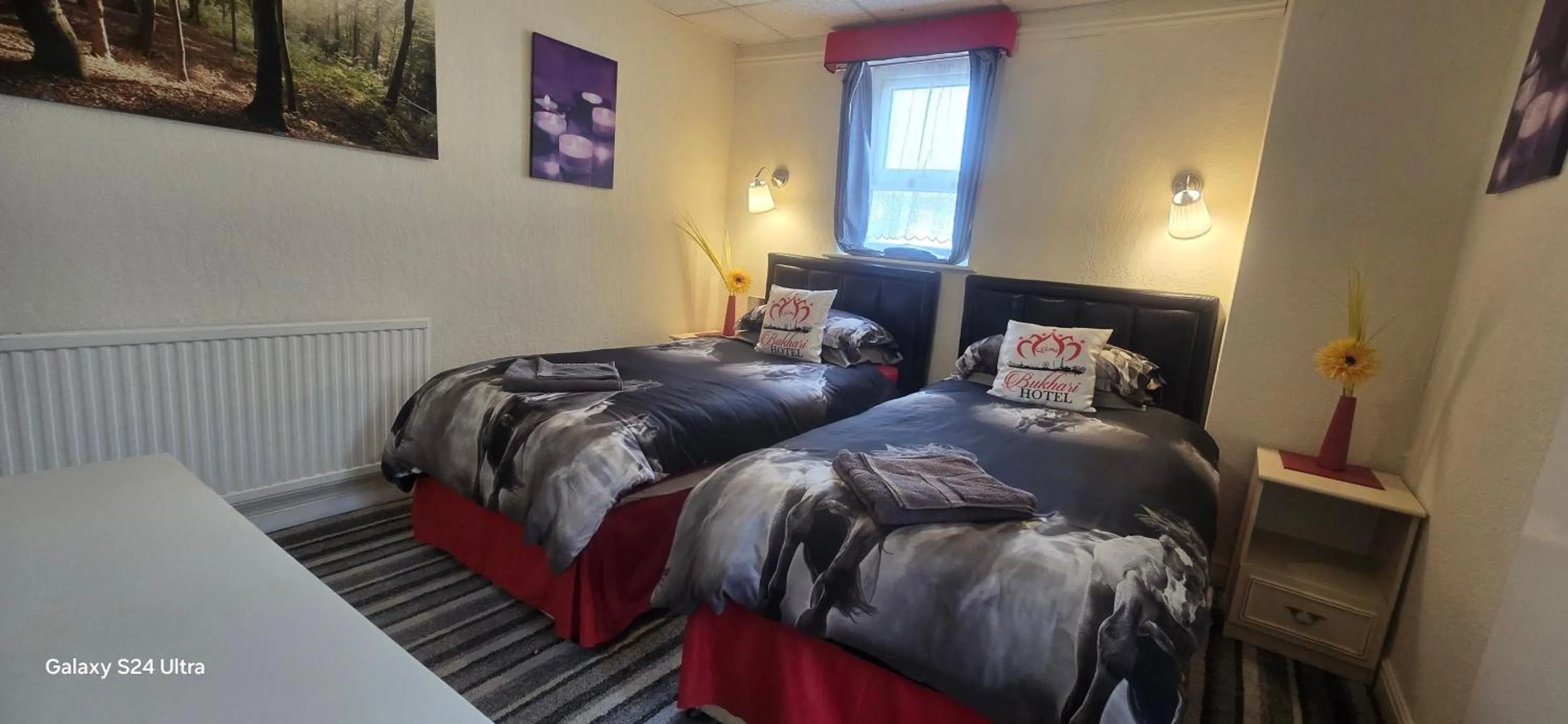 Bed in BUKHARI Hotel