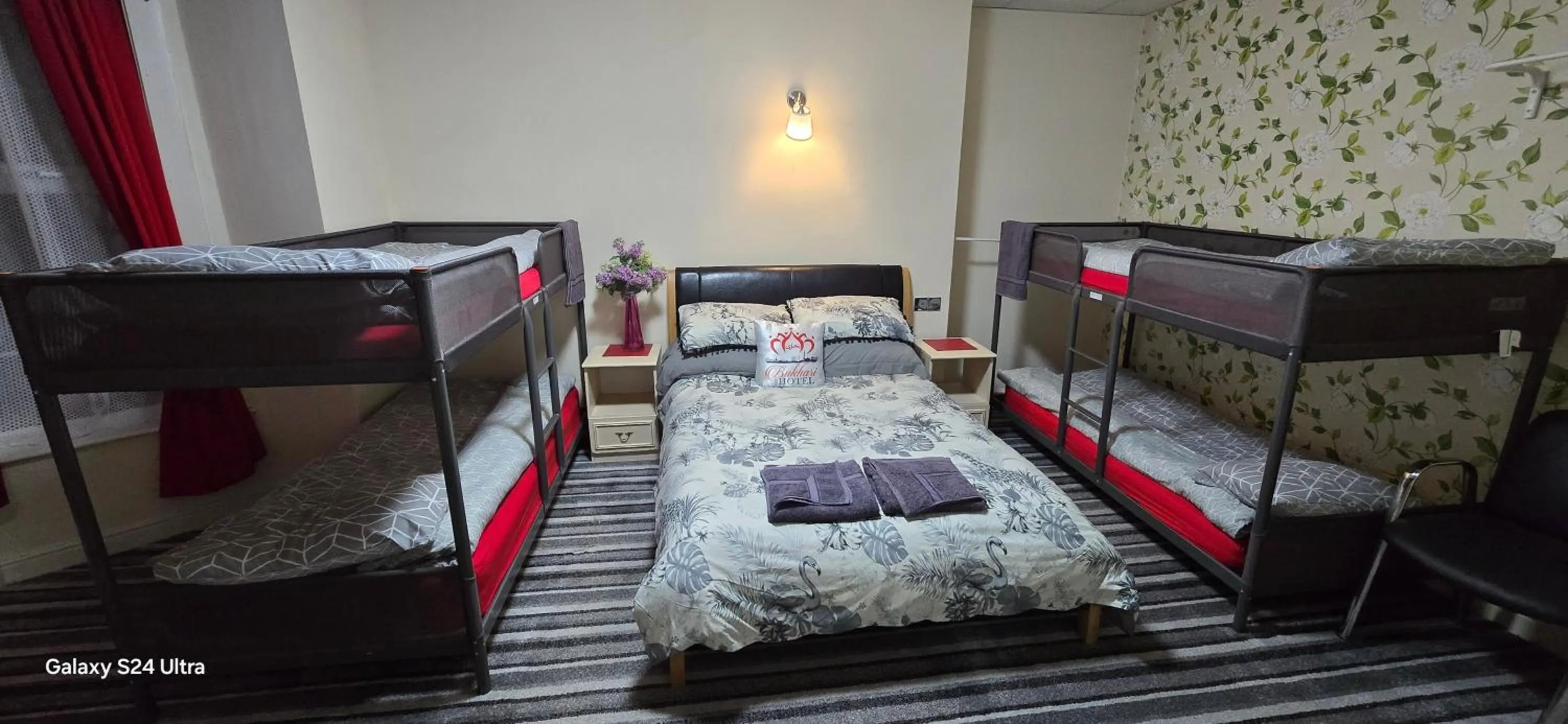 Bed in BUKHARI Hotel