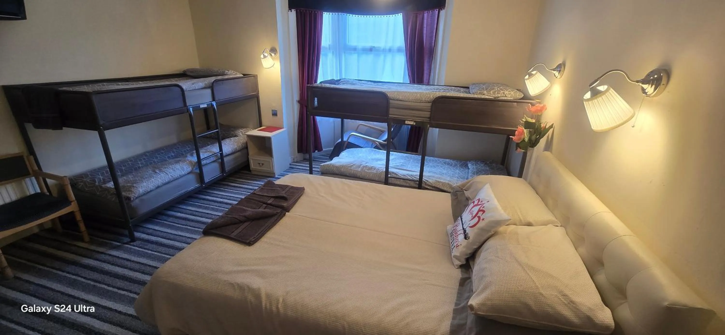 Bed in BUKHARI Hotel