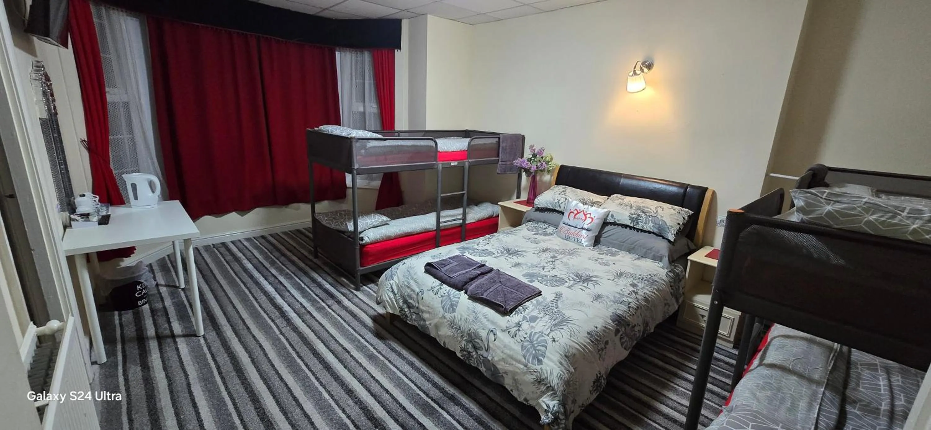 Bed in BUKHARI Hotel