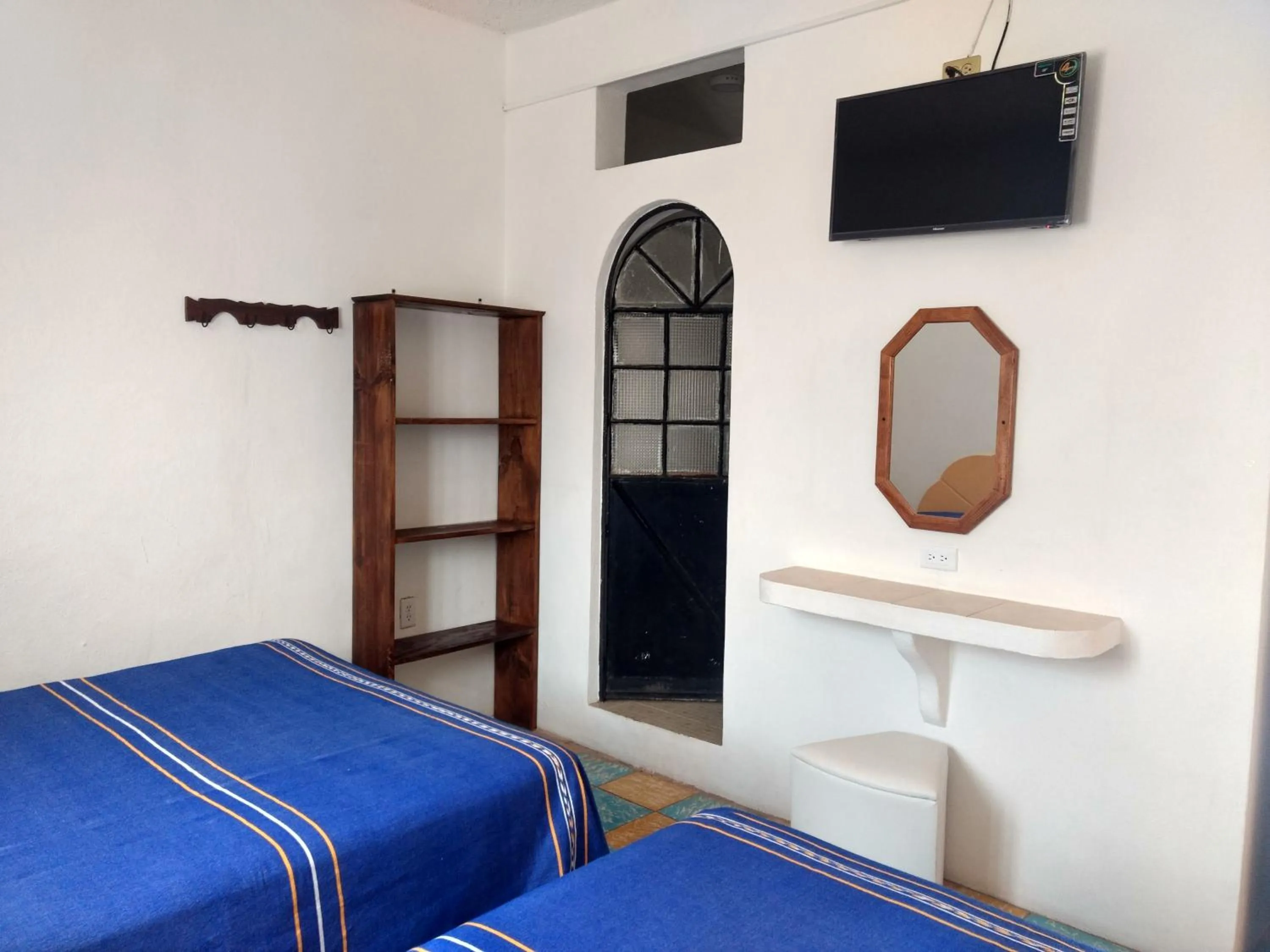 Bed in Hotel Hacienda Morales.