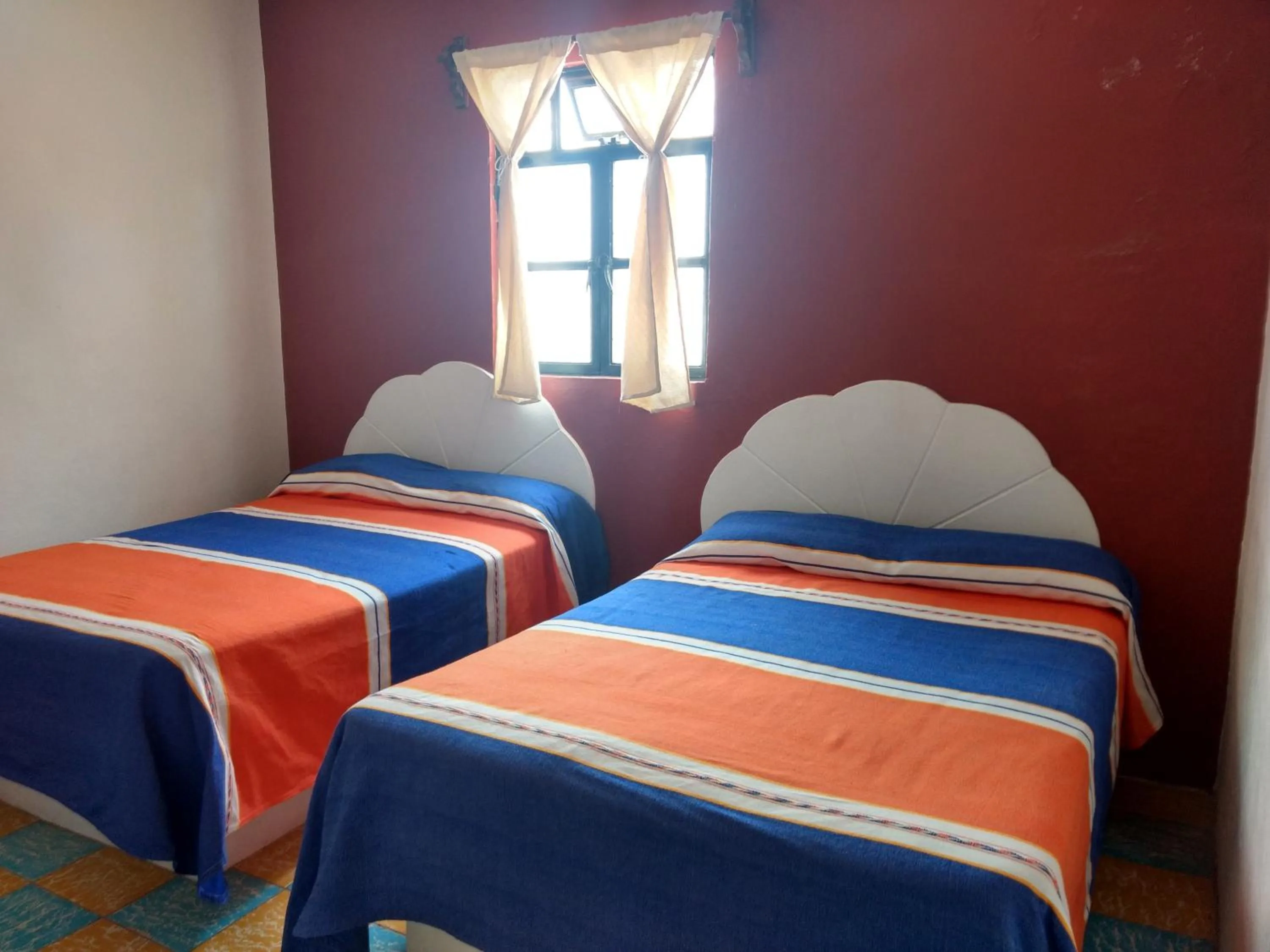 Bed in Hotel Hacienda Morales.