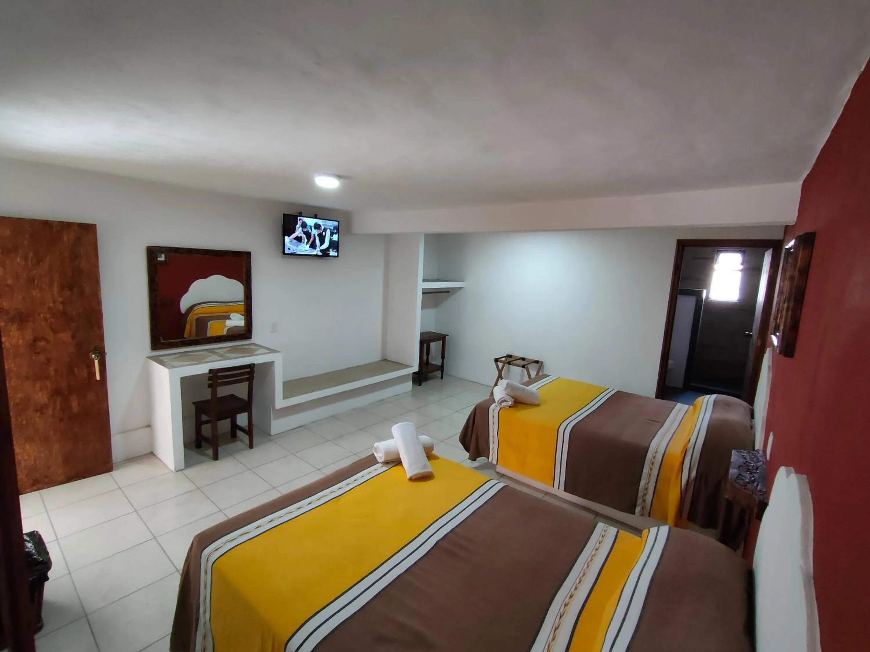 Bed in Hotel Hacienda Morales.