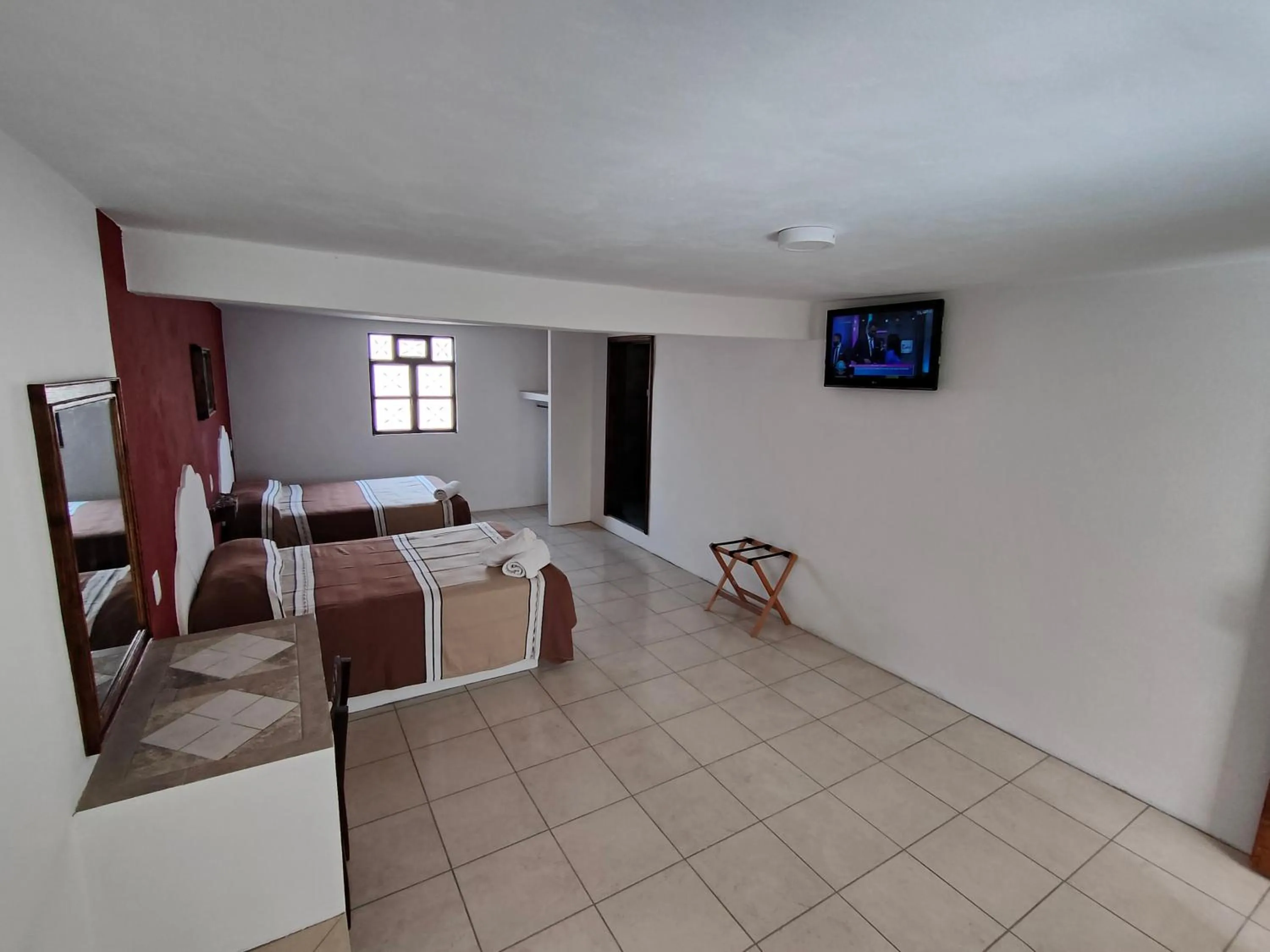 Bed in Hotel Hacienda Morales.