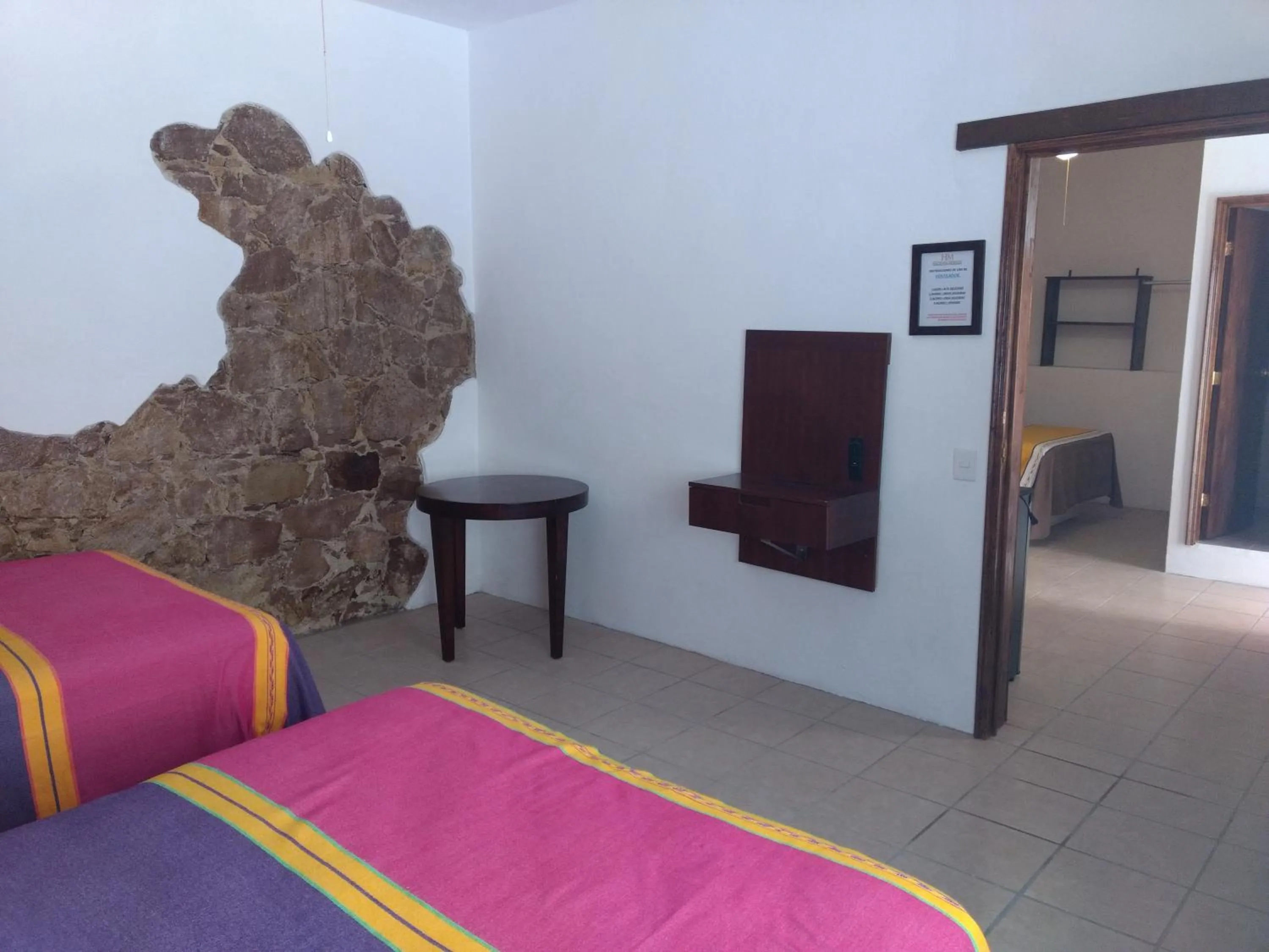 Bed in Hotel Hacienda Morales.