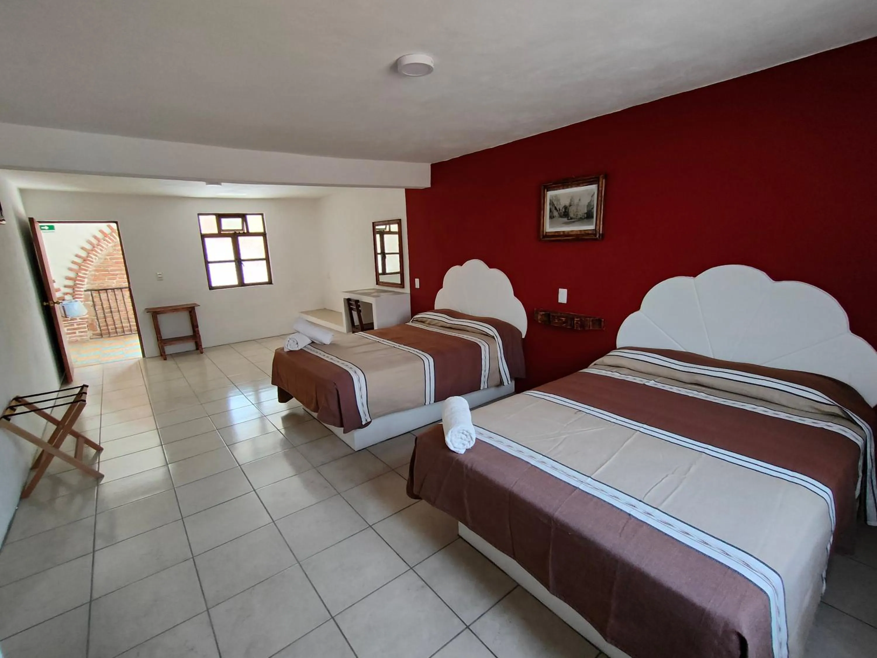 Bed in Hotel Hacienda Morales.