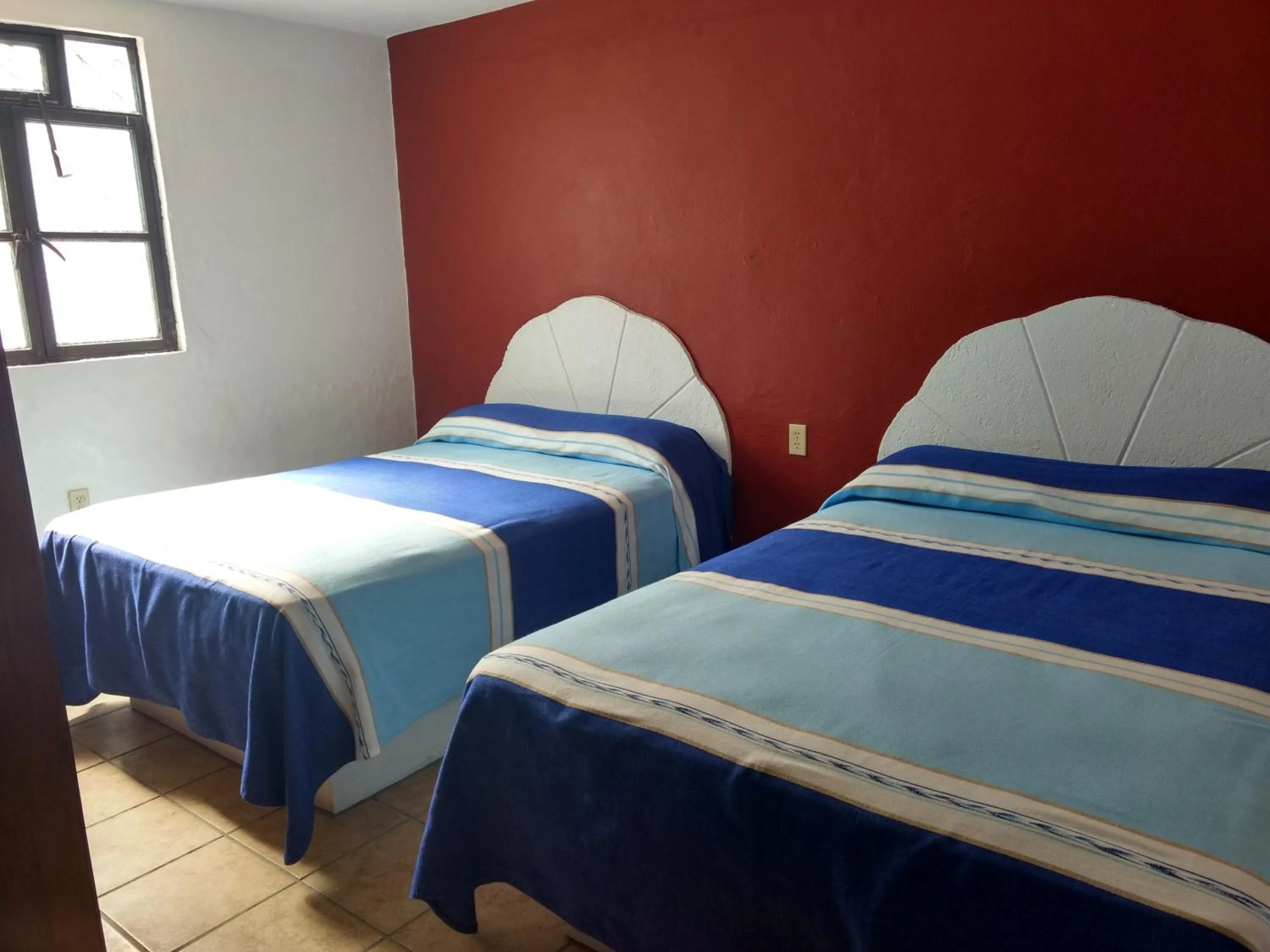 Bed in Hotel Hacienda Morales.