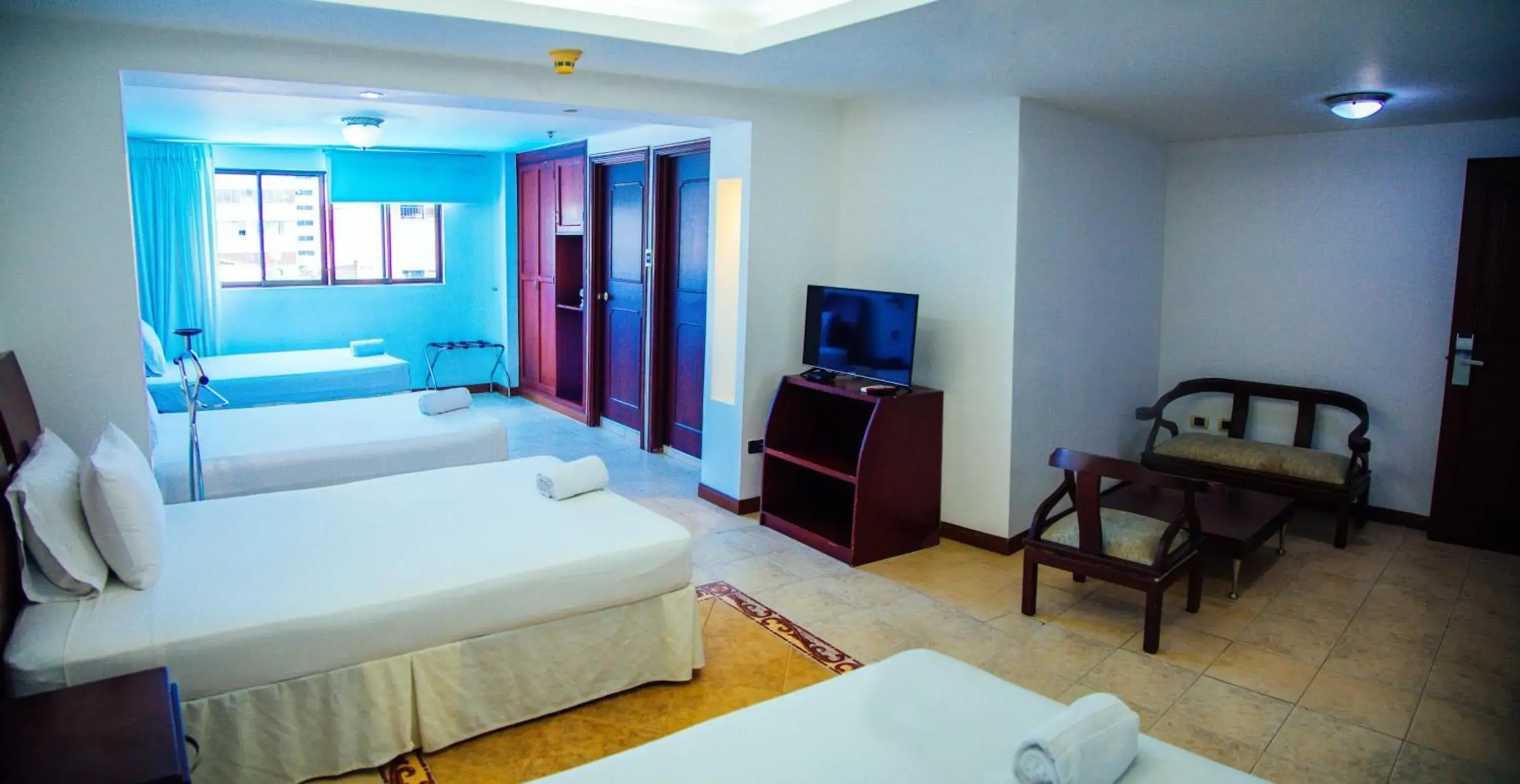 Quadruple Room in Hotel Plaza Las Américas Cali Quadruple Room in Hotel Plaza Las Américas Cali