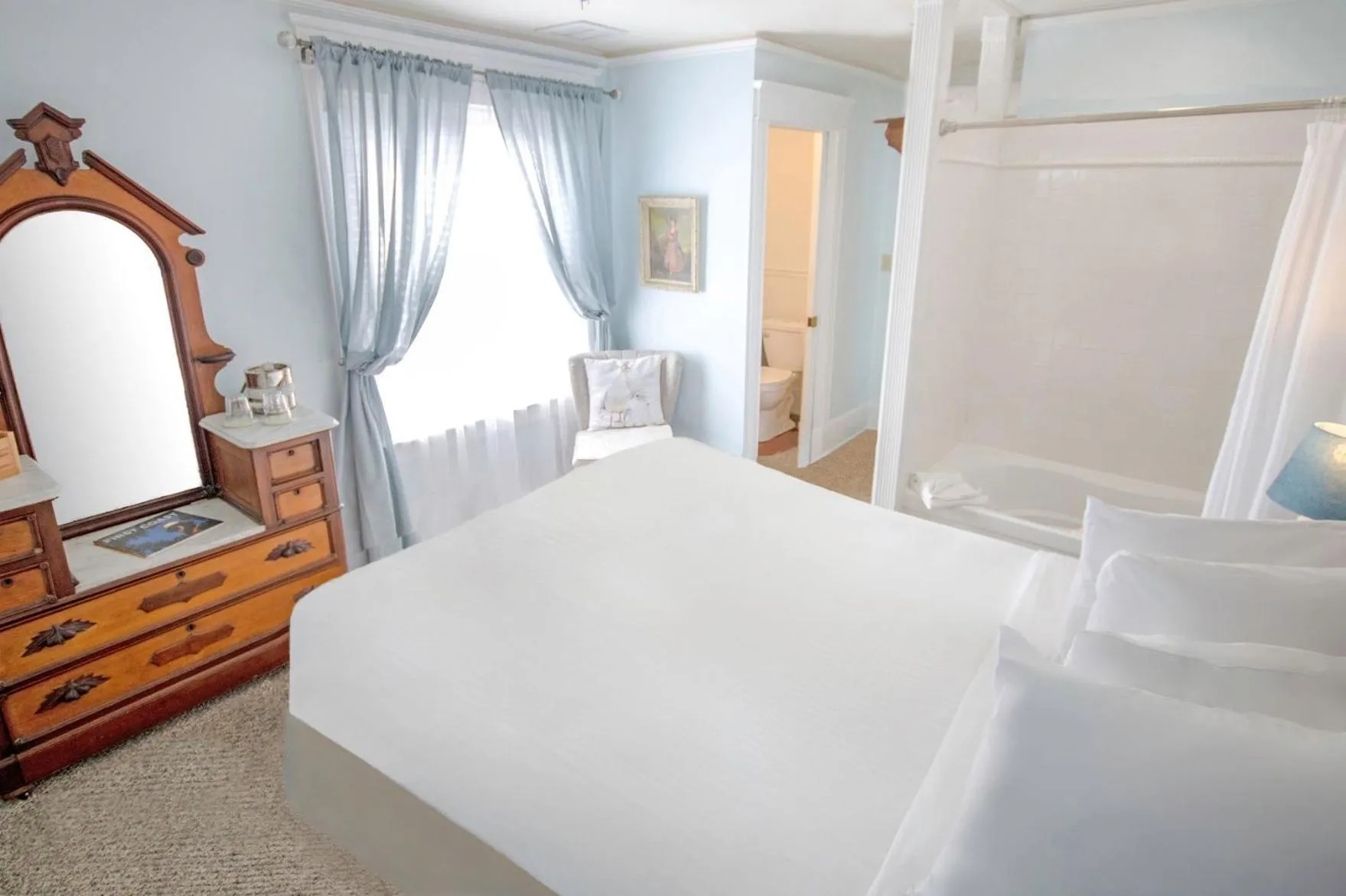 Bed in Inn on Charlotte Boutique Hotel