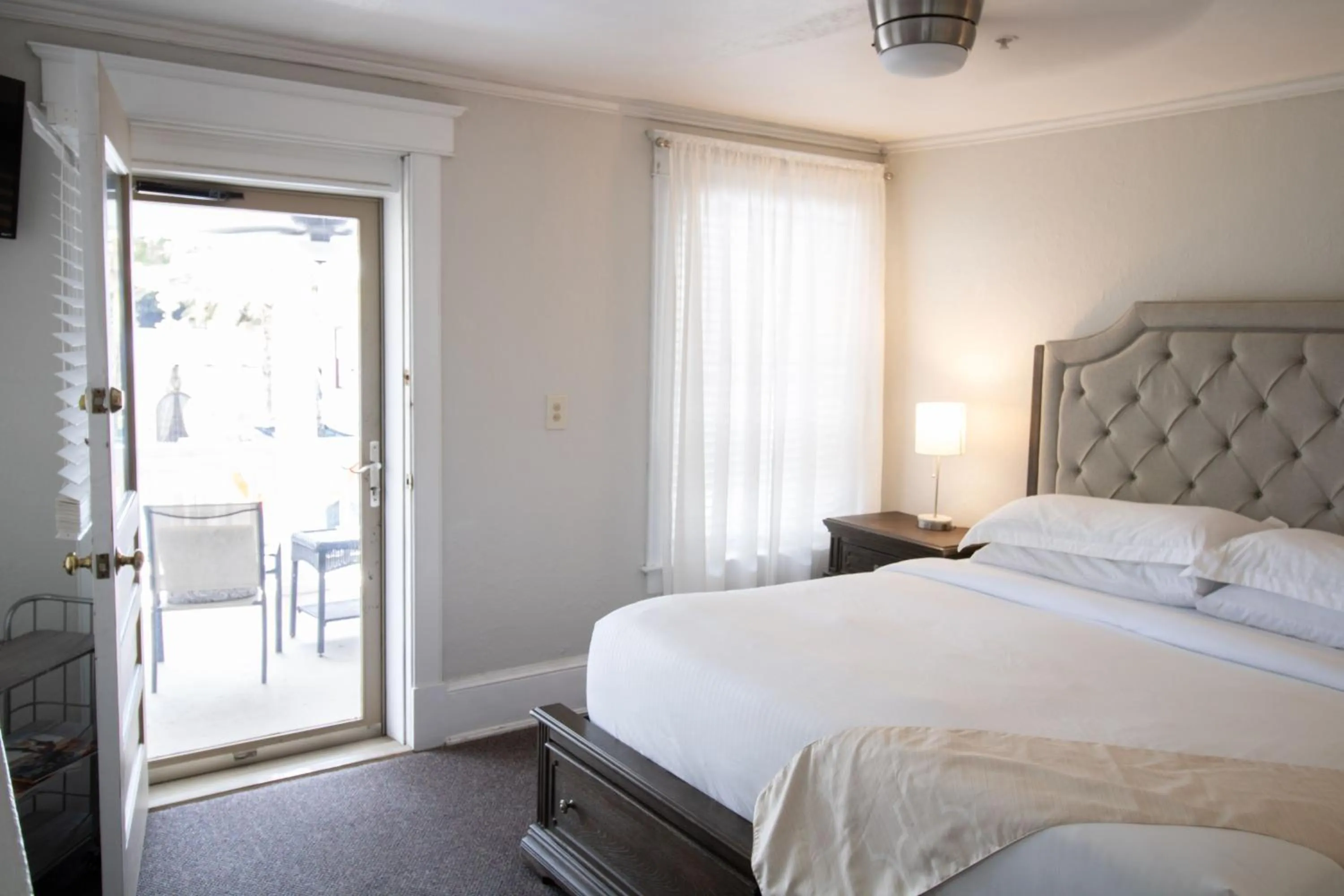 Bed in Inn on Charlotte Boutique Hotel