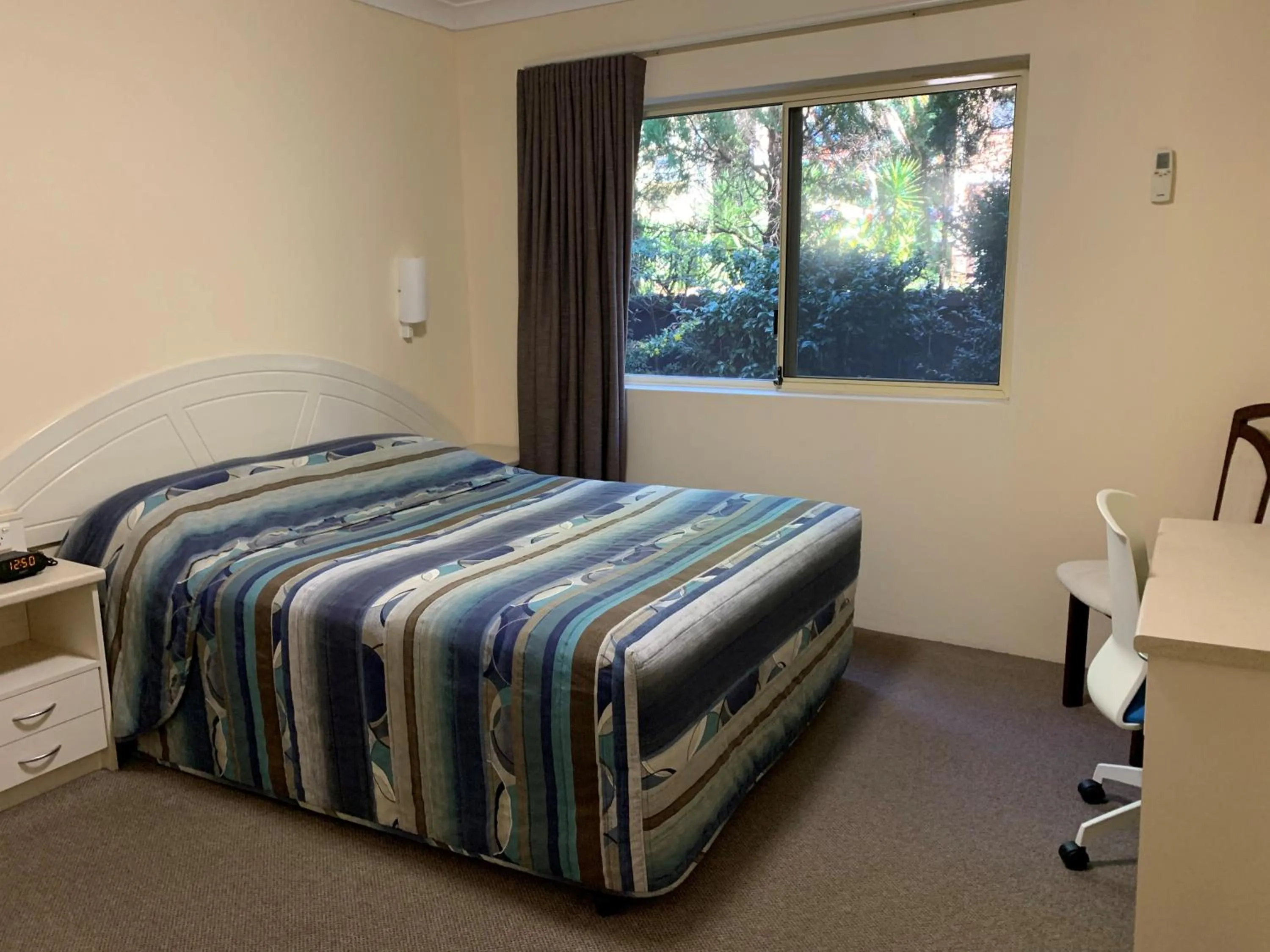 Bed in Bel Mondo Apartments