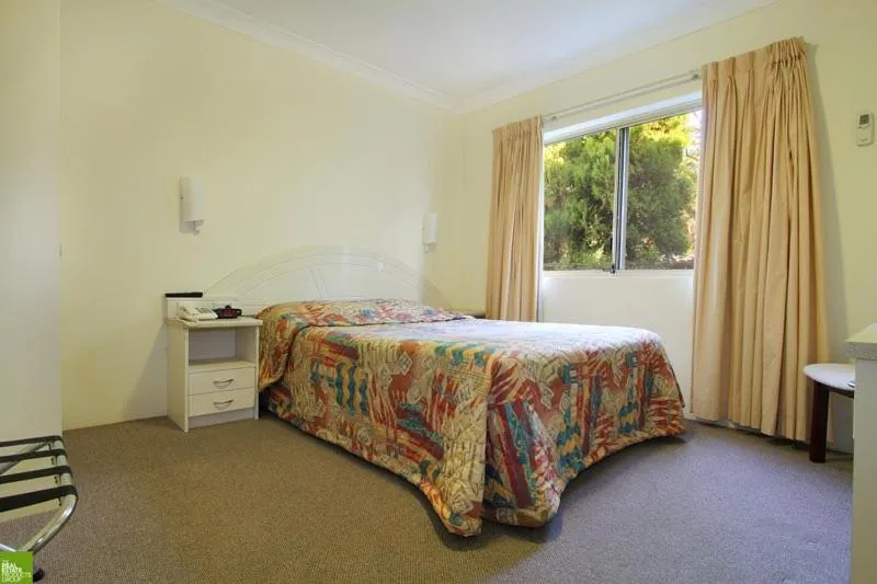 Bed in Bel Mondo Apartments