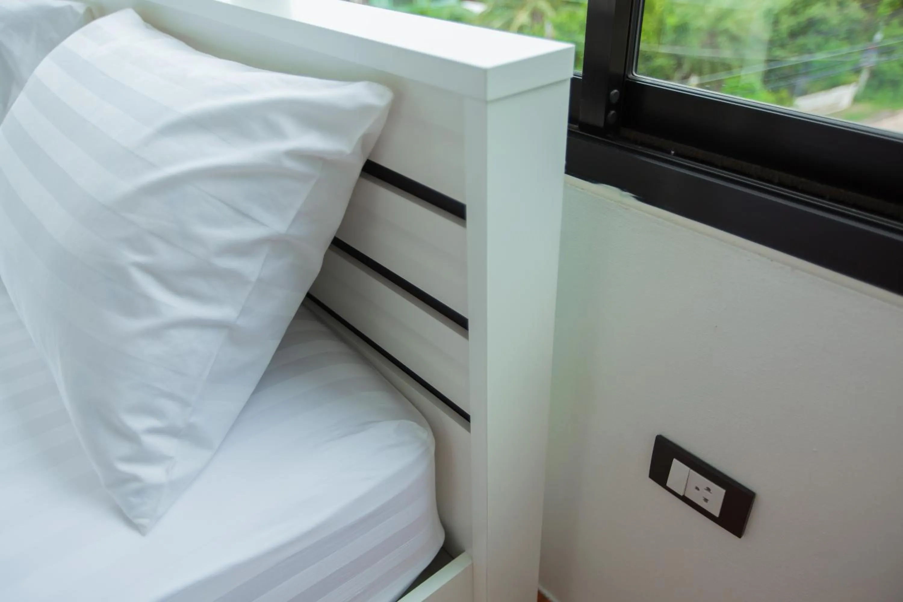 Bed in THAMM Residence