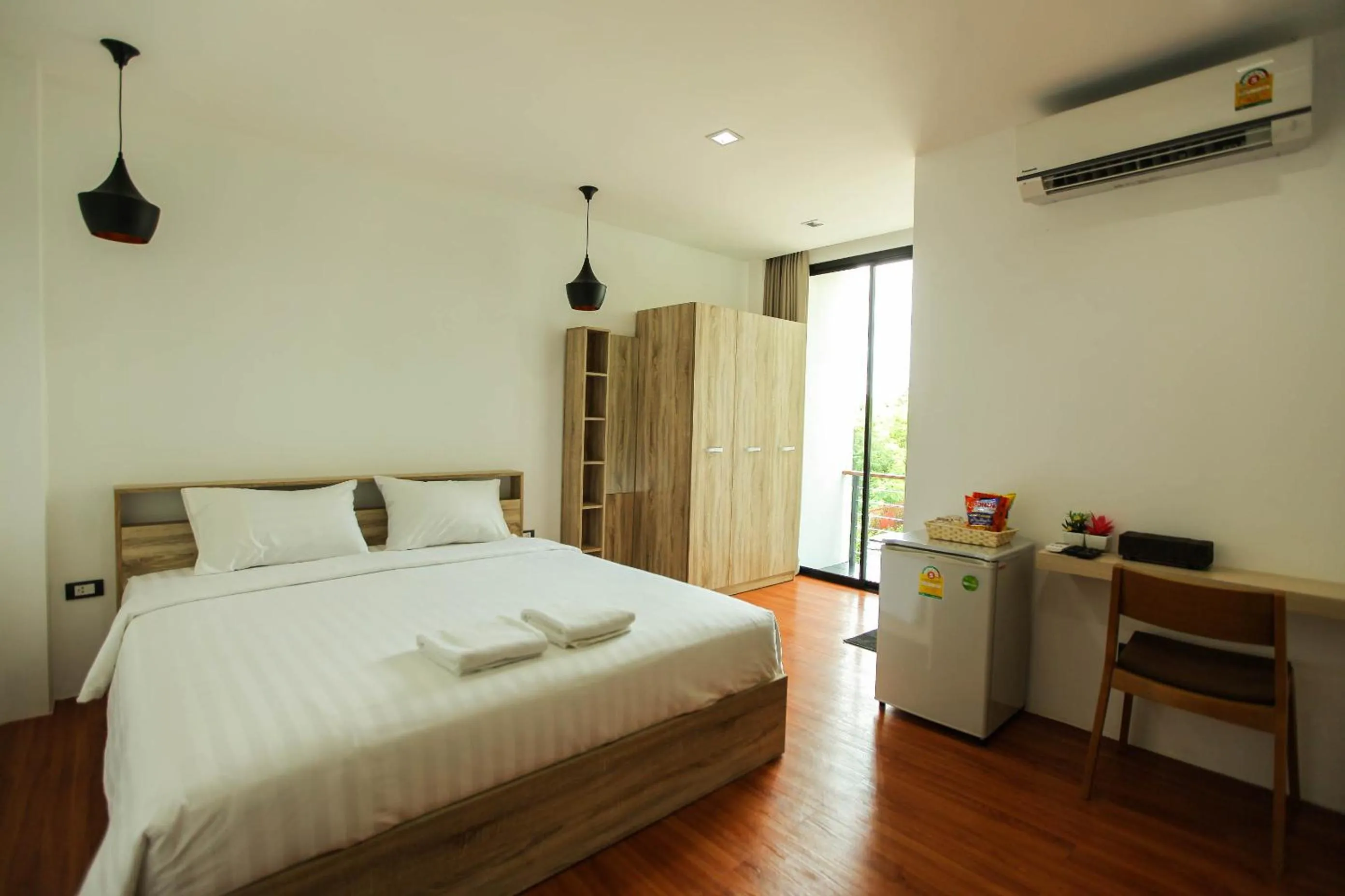 Bed in THAMM Residence