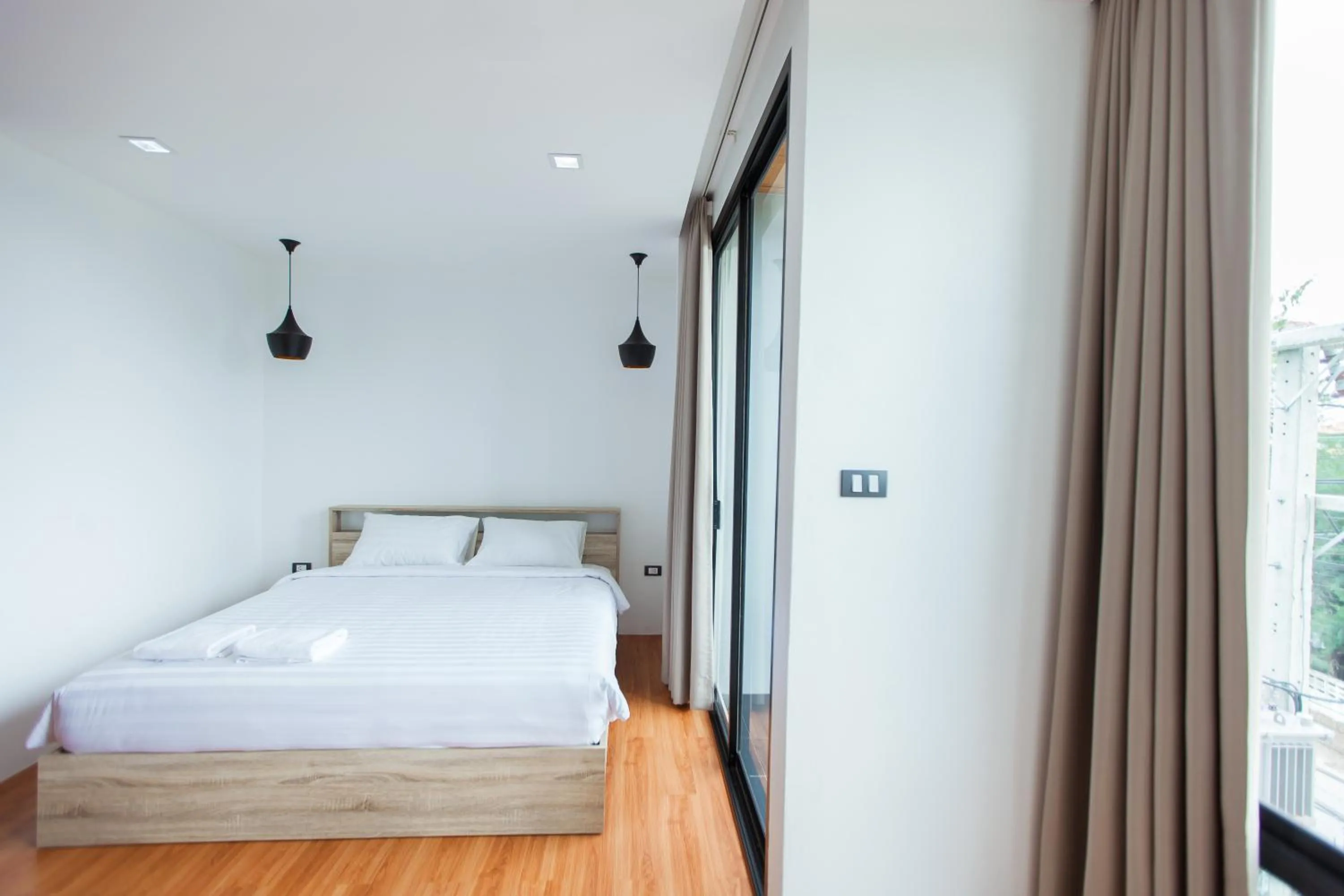 Bed in THAMM Residence