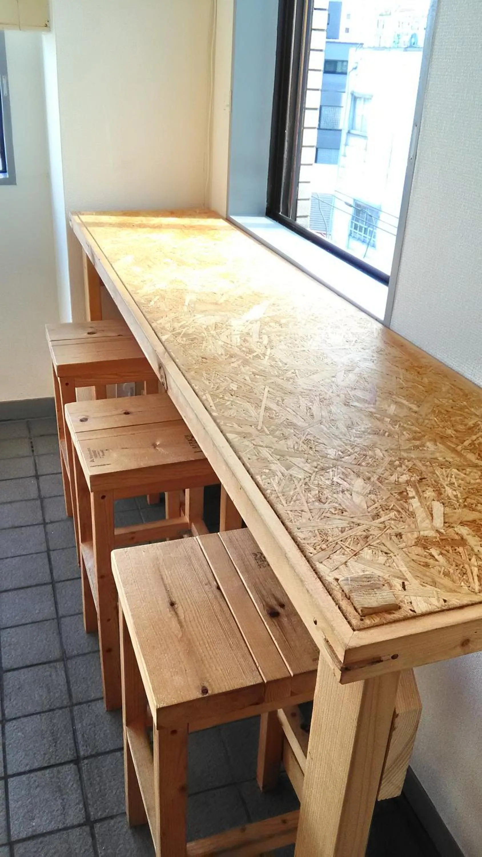 Communal lounge/ TV room in Base Inn Komagome Tokyo