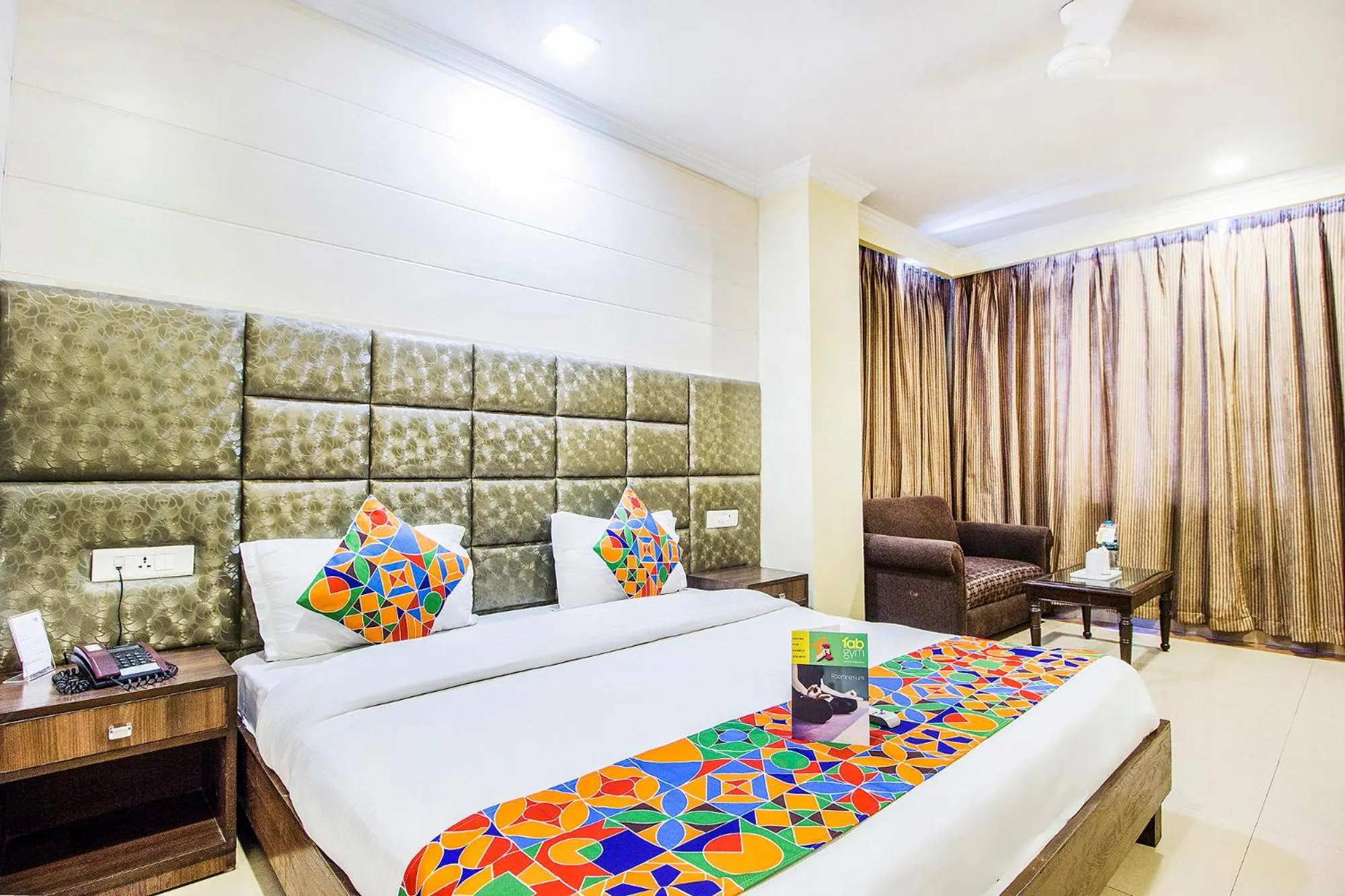 Living room, Bed in FabHotel Aaykay Model Town