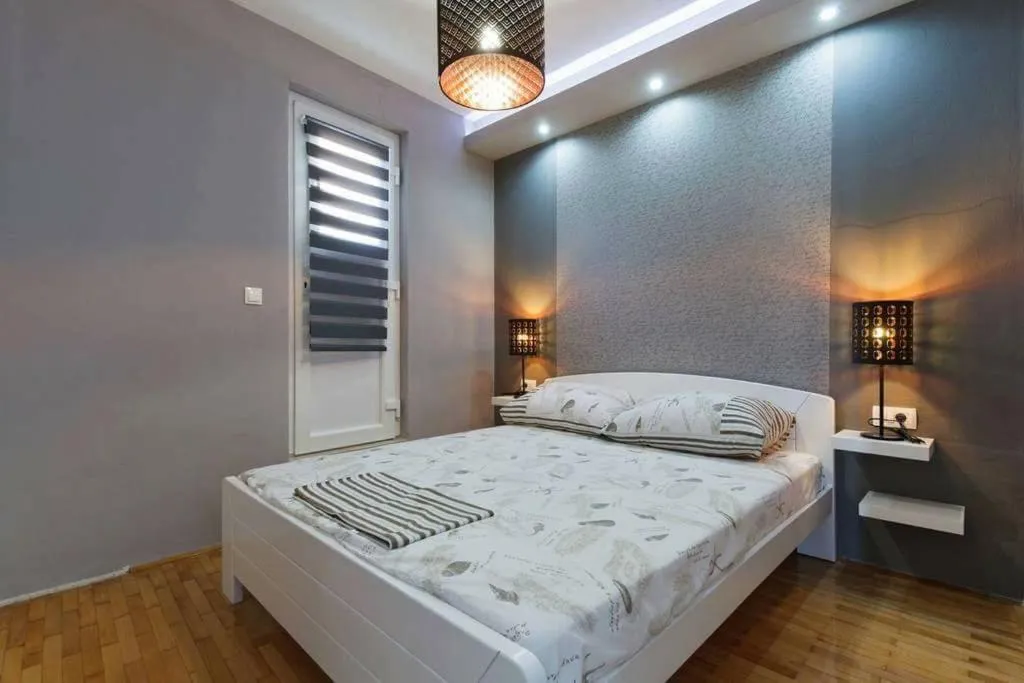 Bed in Apartments Romantica