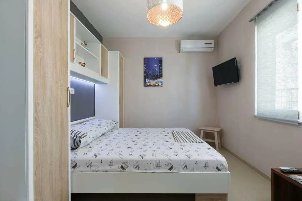 Bed in Apartments Romantica