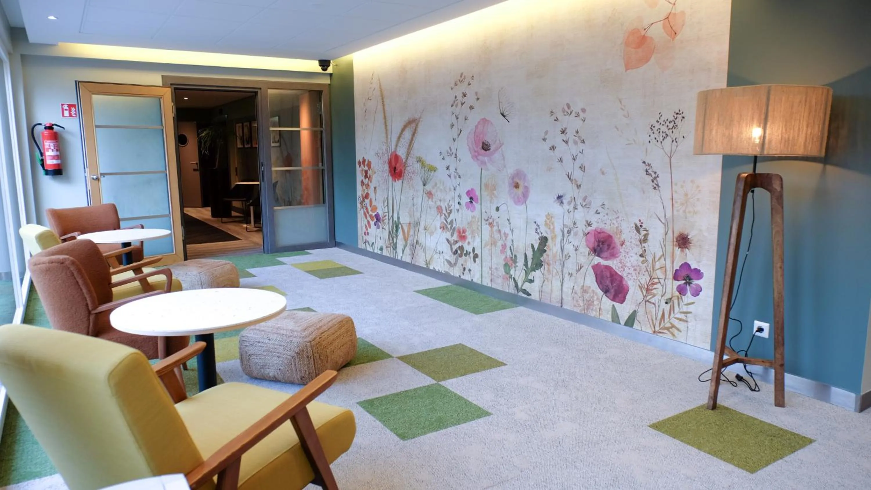 Communal lounge/ TV room in Novotel Luxembourg Kirchberg