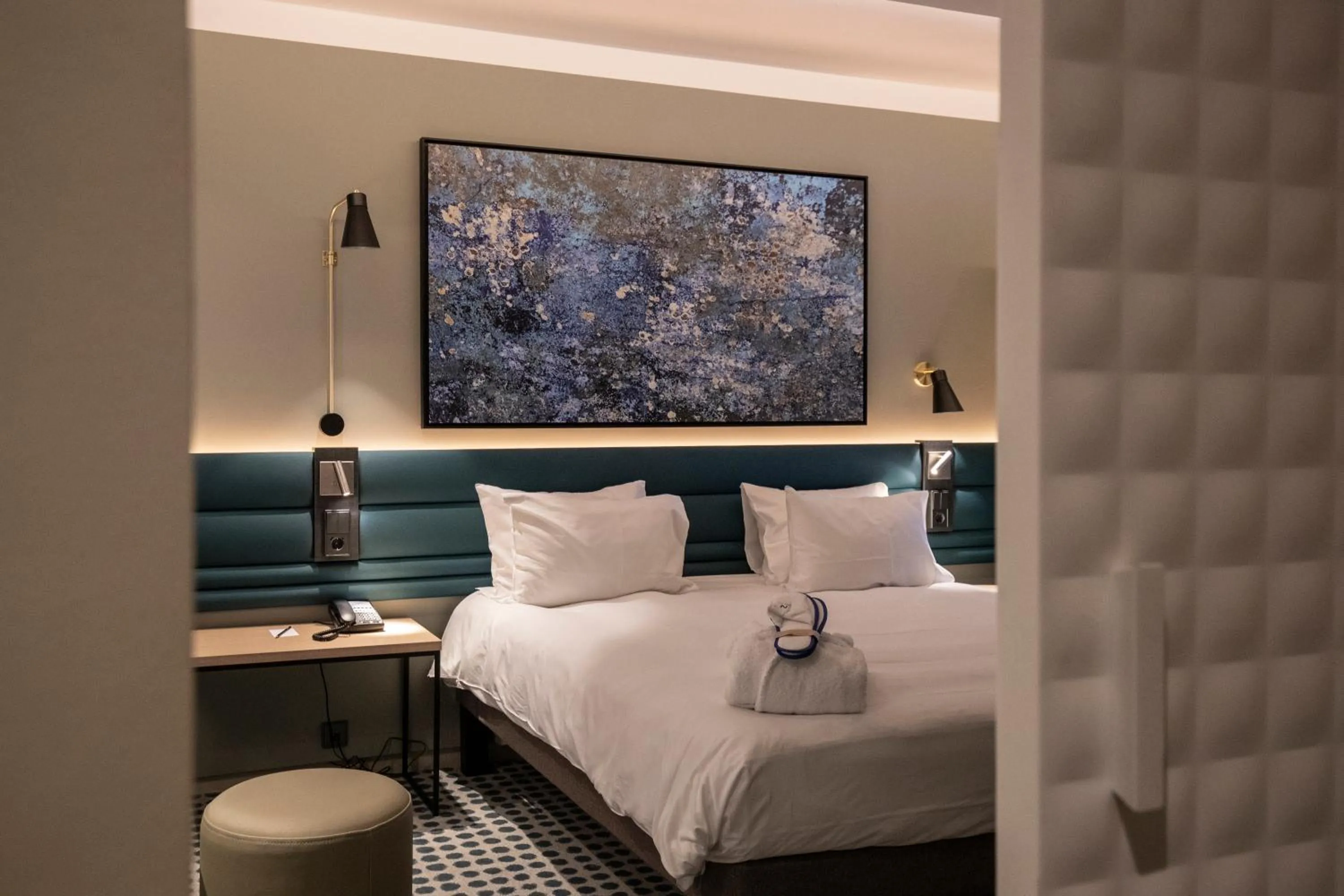 Bed in Novotel Luxembourg Kirchberg