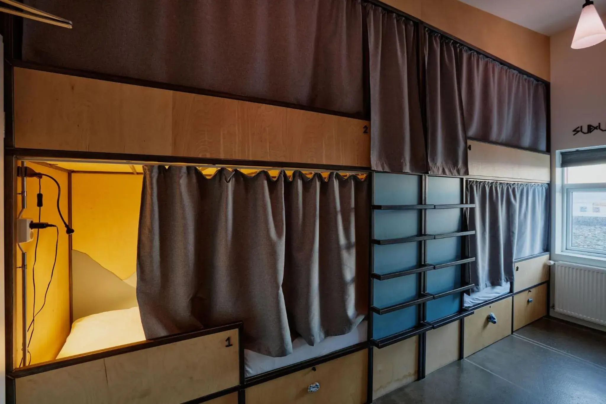 Bed in 6-Bed Mixed Dormitory Room in Midgard Base Camp Bed in 6-Bed Mixed Dormitory Room in Midgard Base Camp