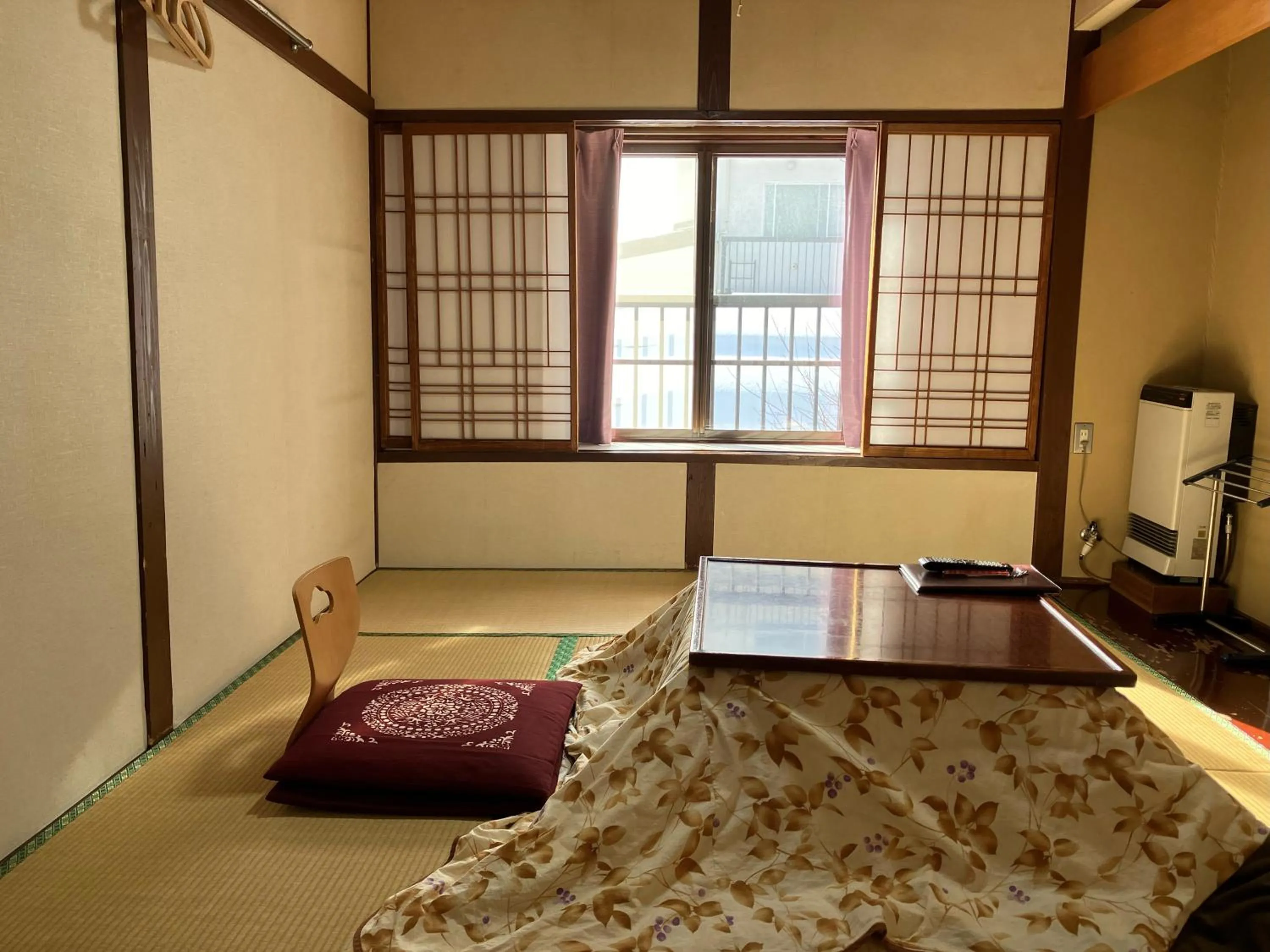 Photo of the whole room, Bed in Takasagoya Ryokan