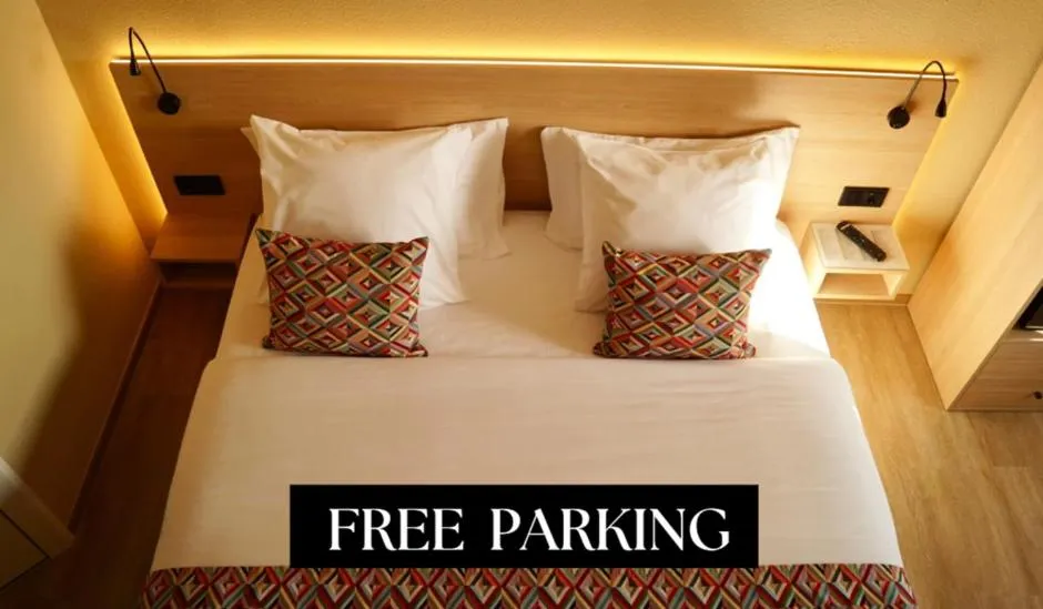 Bed in Hotel-Restaurant Stand'Inn