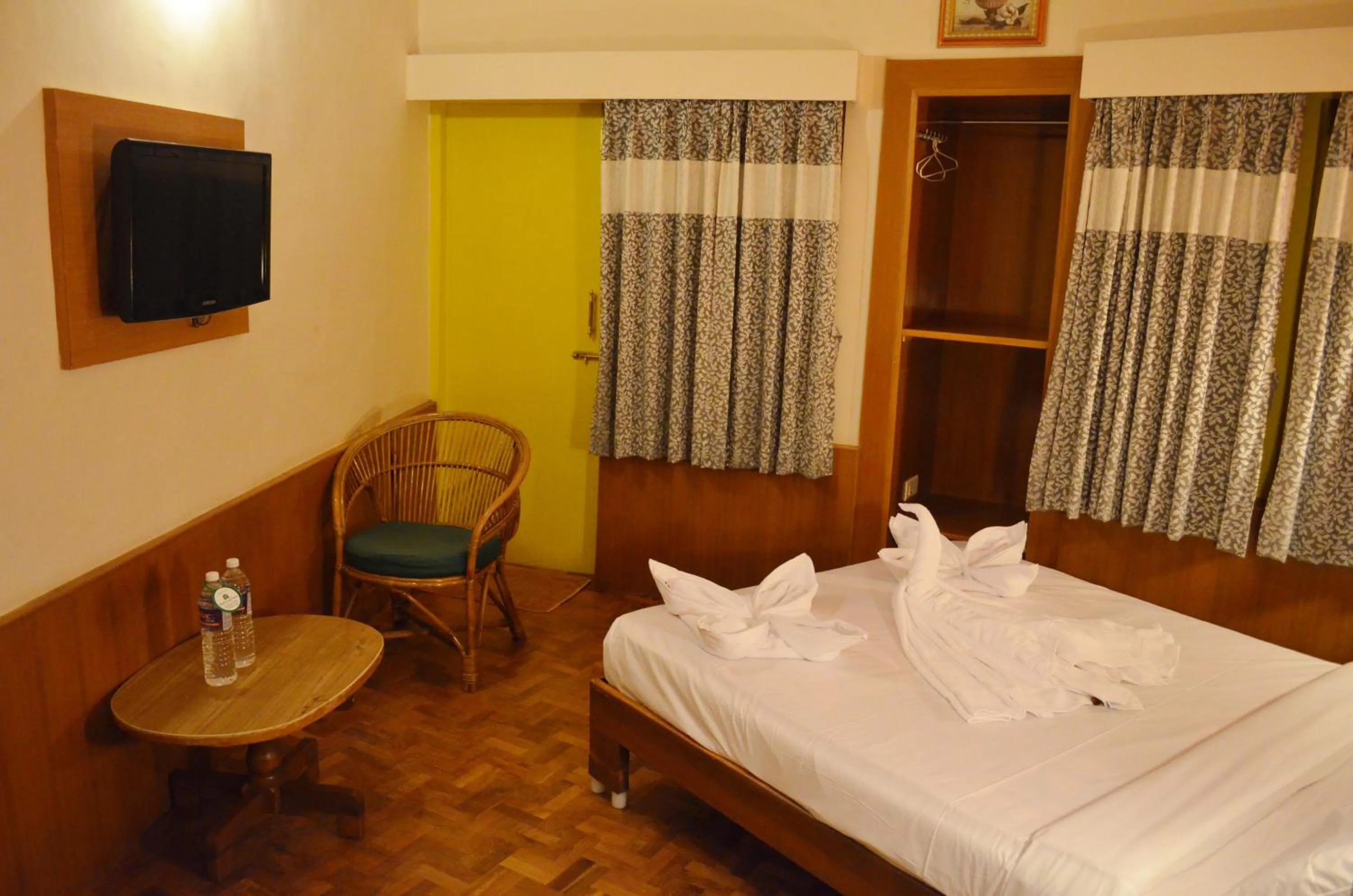 Bed in Hotel Grand Palace