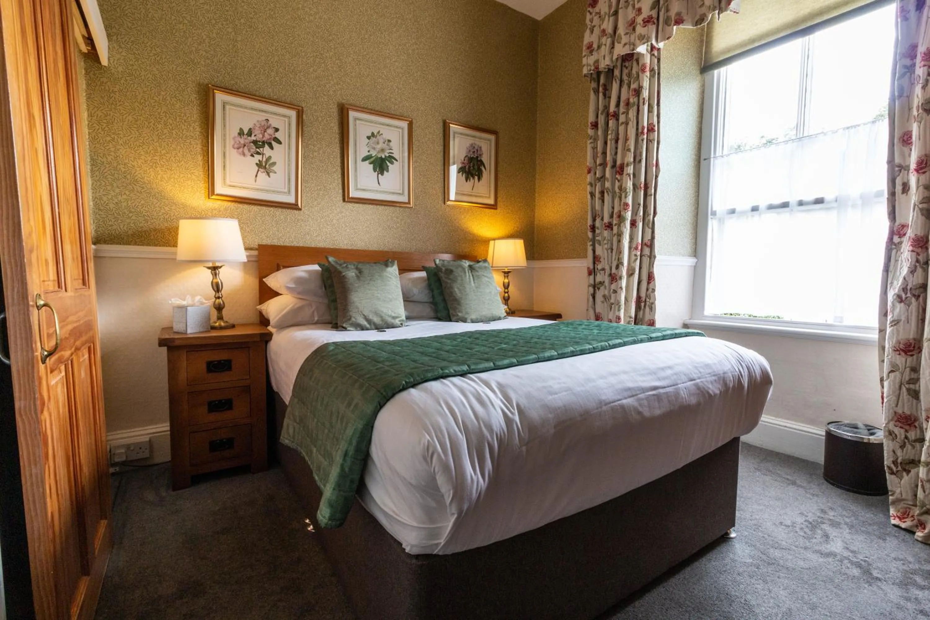 Bed in The Old Dungeon Ghyll Hotel