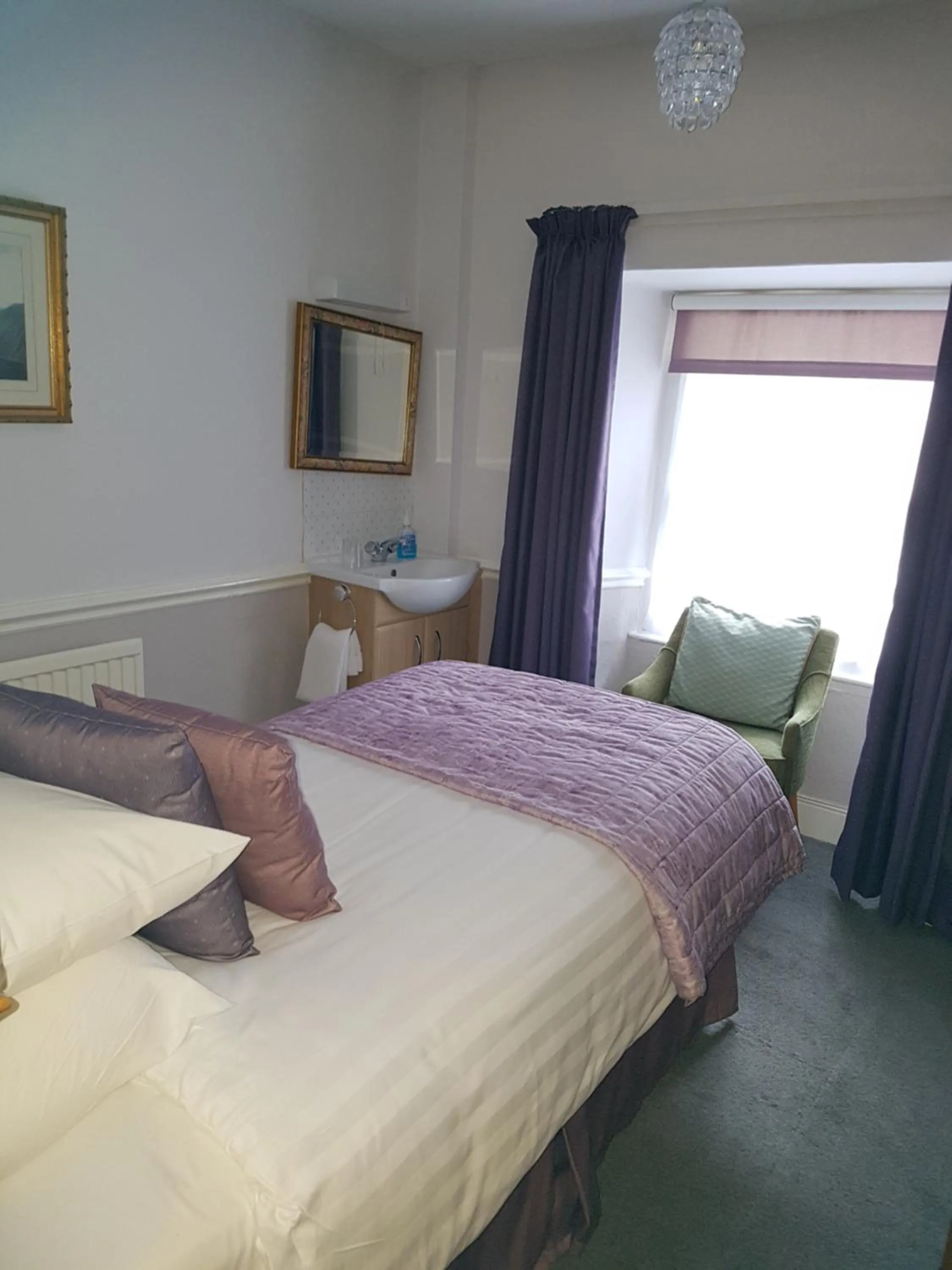 Bed in The Old Dungeon Ghyll Hotel