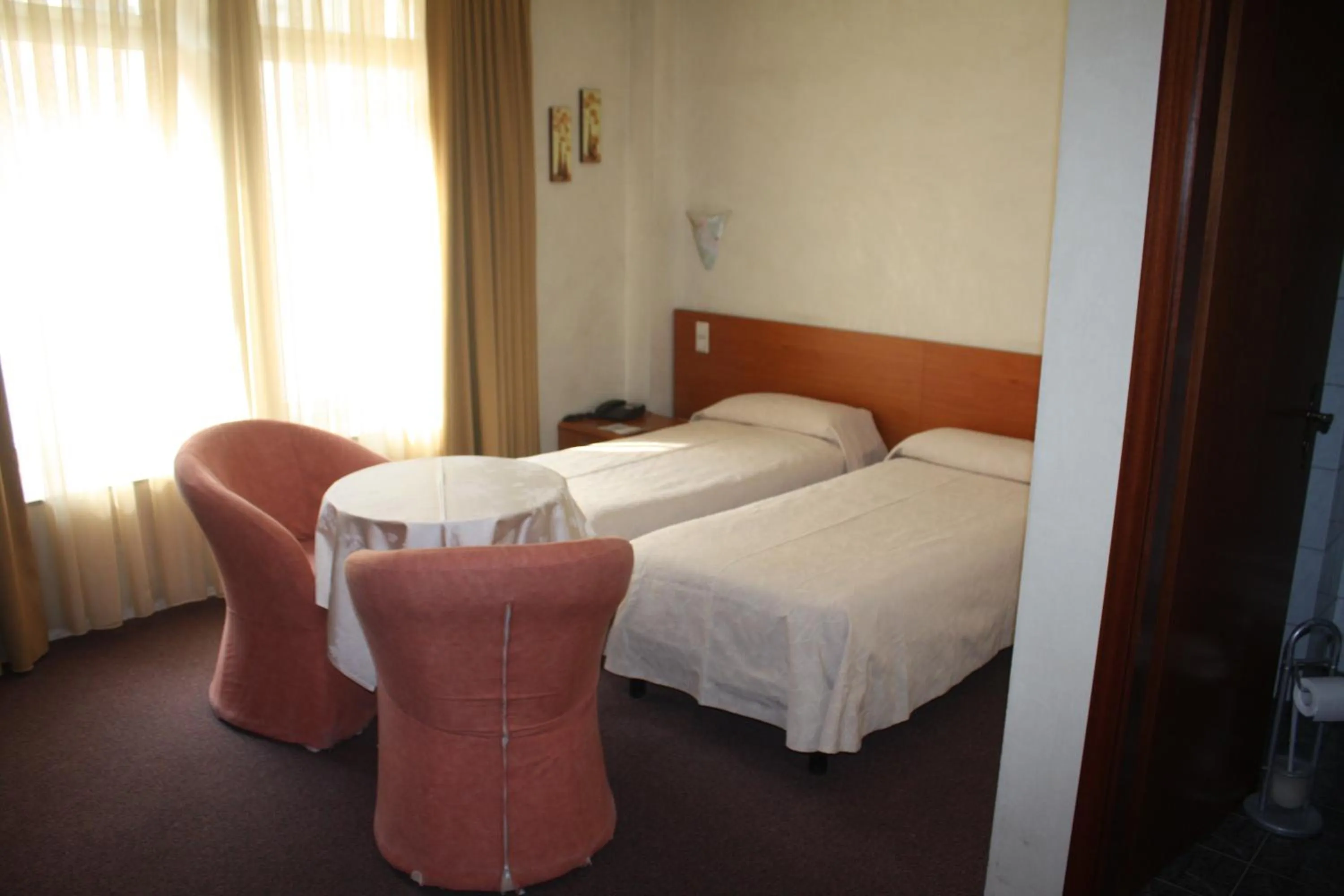 Photo of the whole room, Bed in Auberge Gaglioti