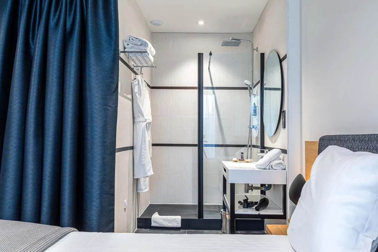 Bed in Hotel Le Saint Gelais