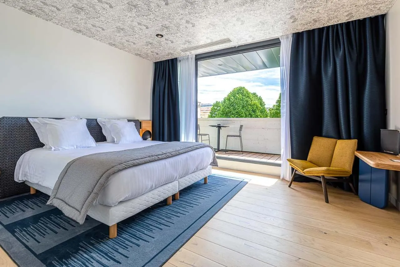 Bed in Hotel Le Saint Gelais