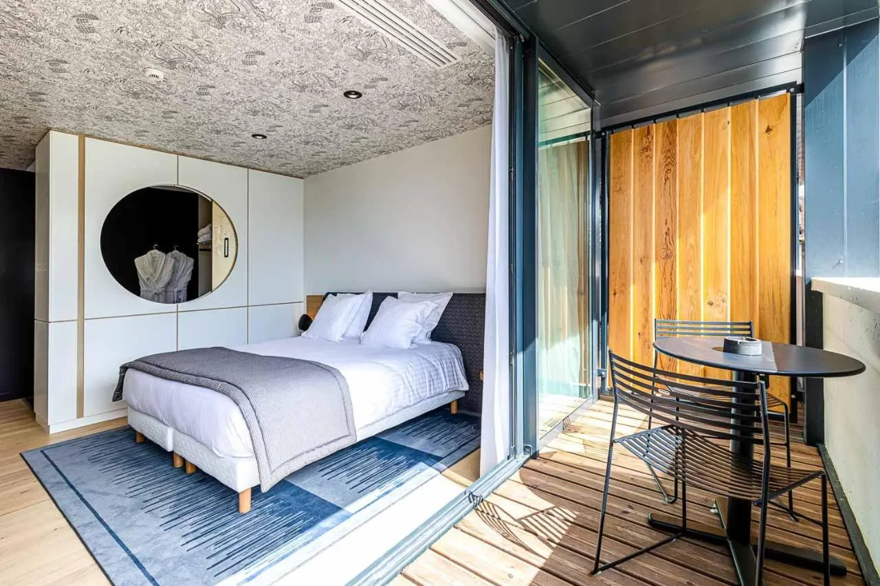 Bed in Hotel Le Saint Gelais