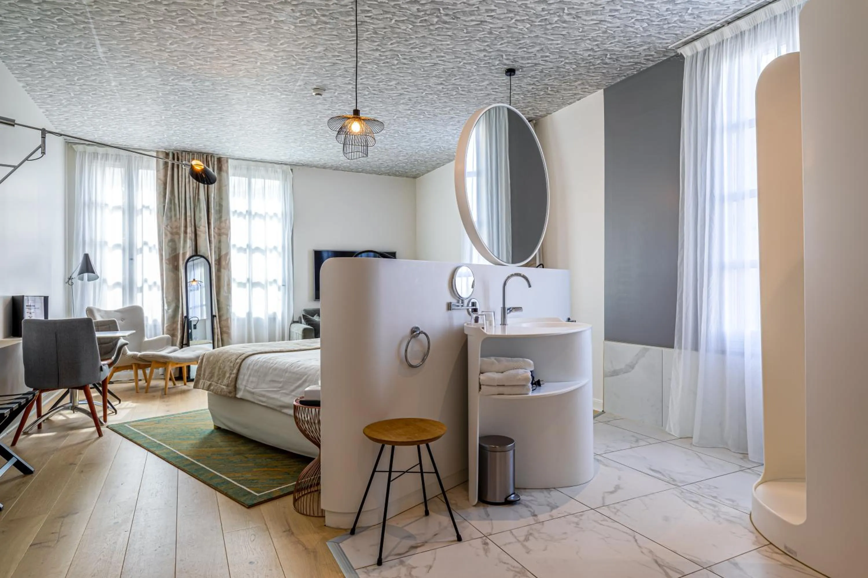 Bed in Hotel Le Saint Gelais