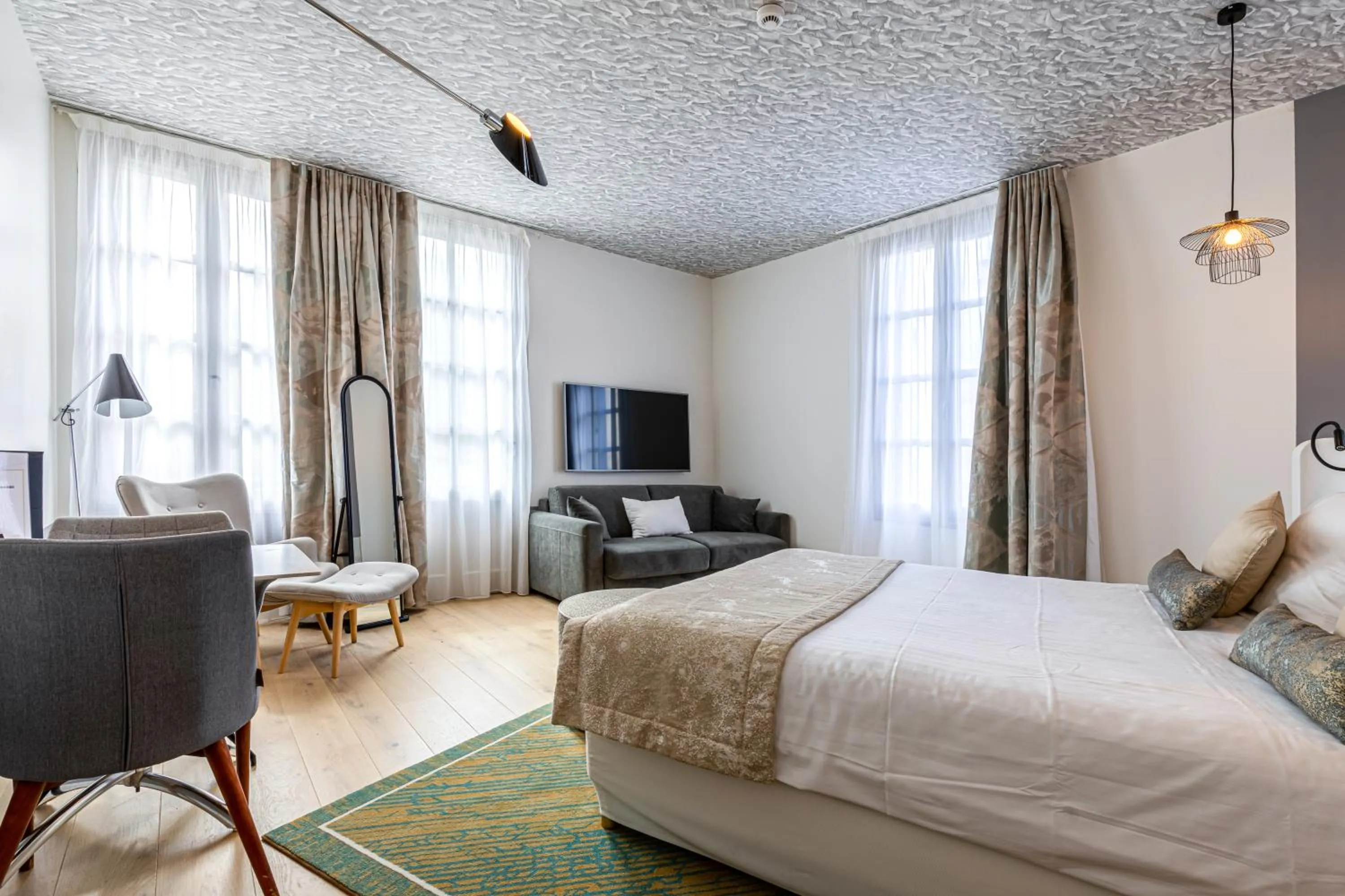 Bed in Hotel Le Saint Gelais