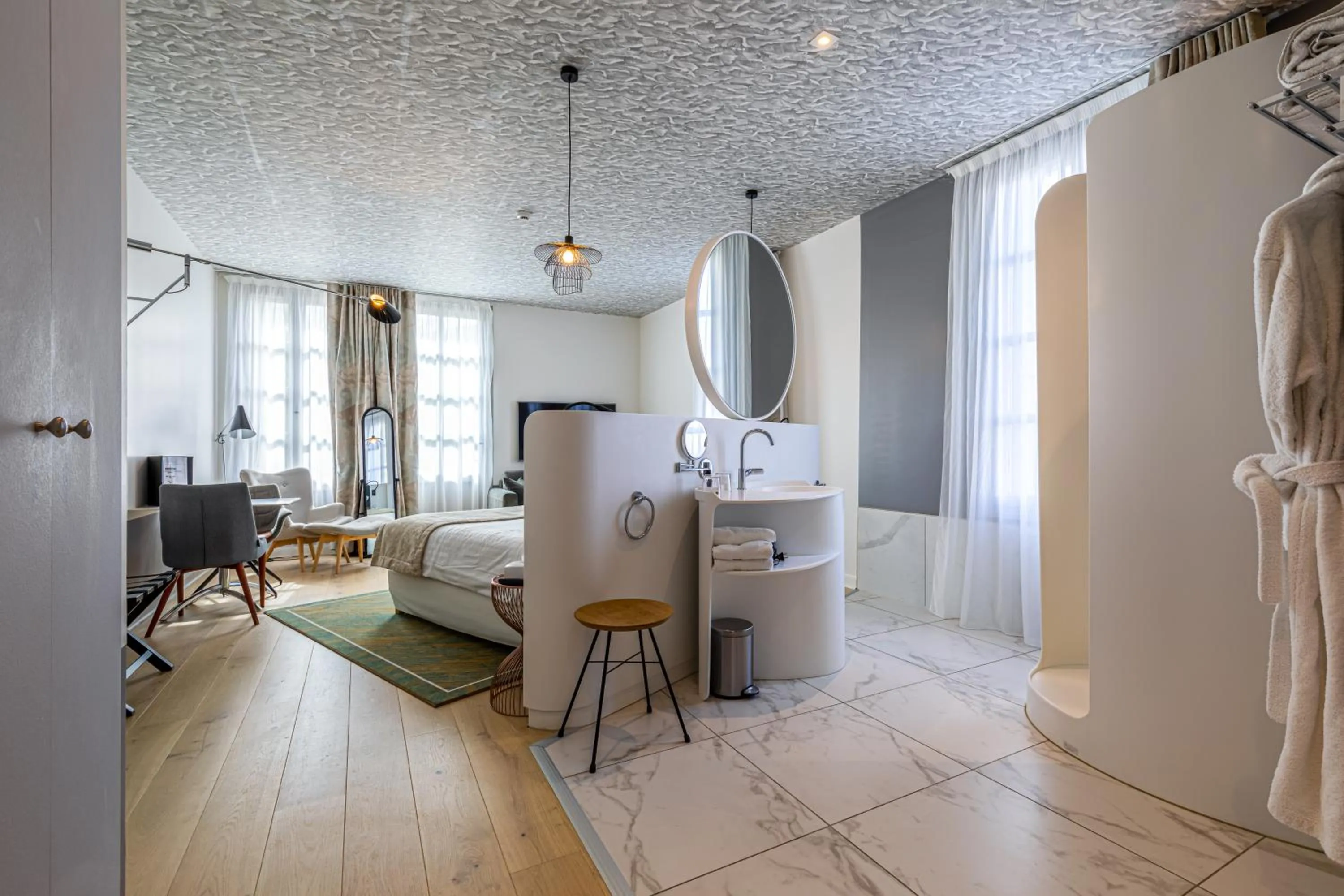 Bed in Hotel Le Saint Gelais