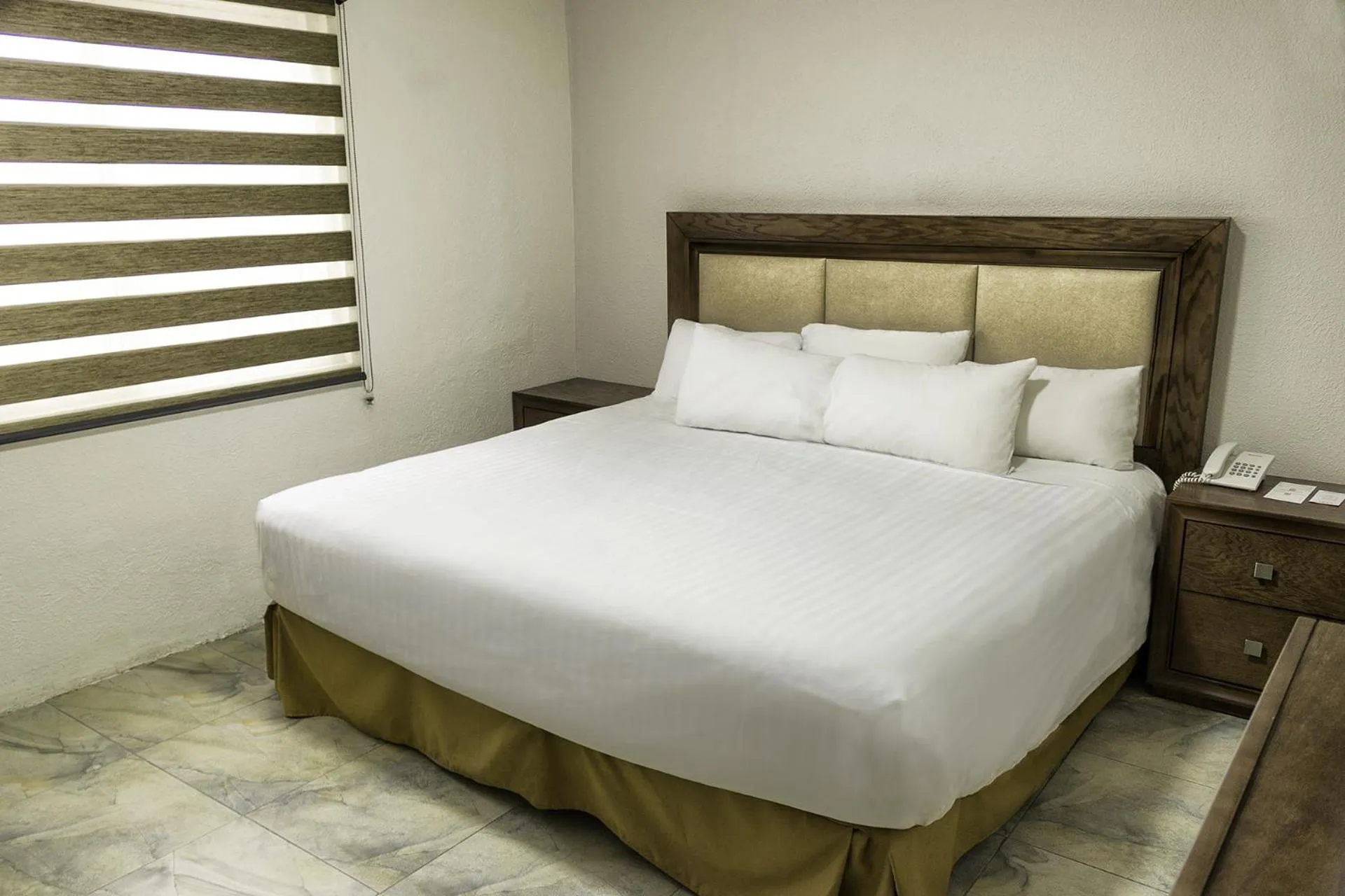 Bed in Hotel Adriana