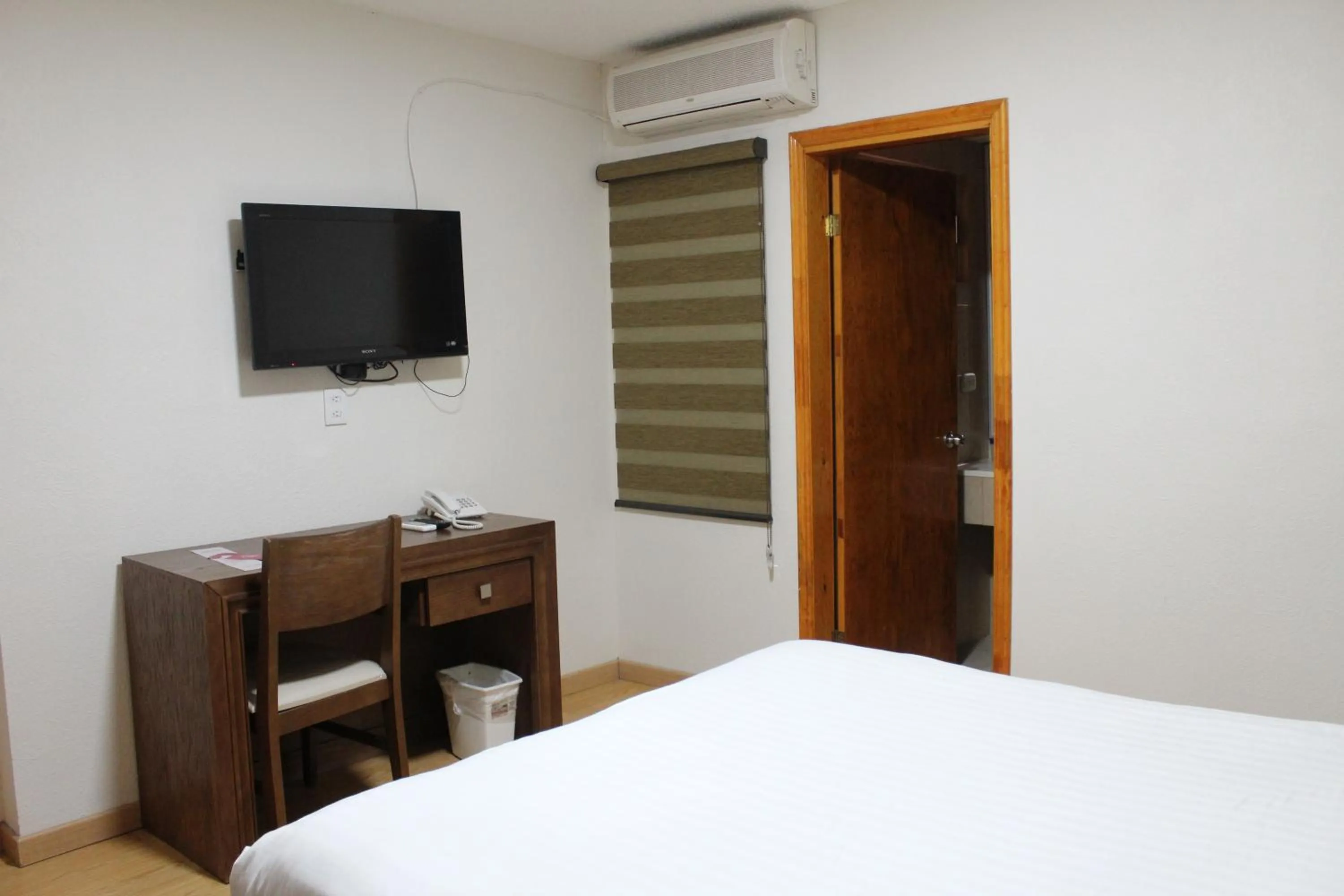 Bed in Hotel Adriana