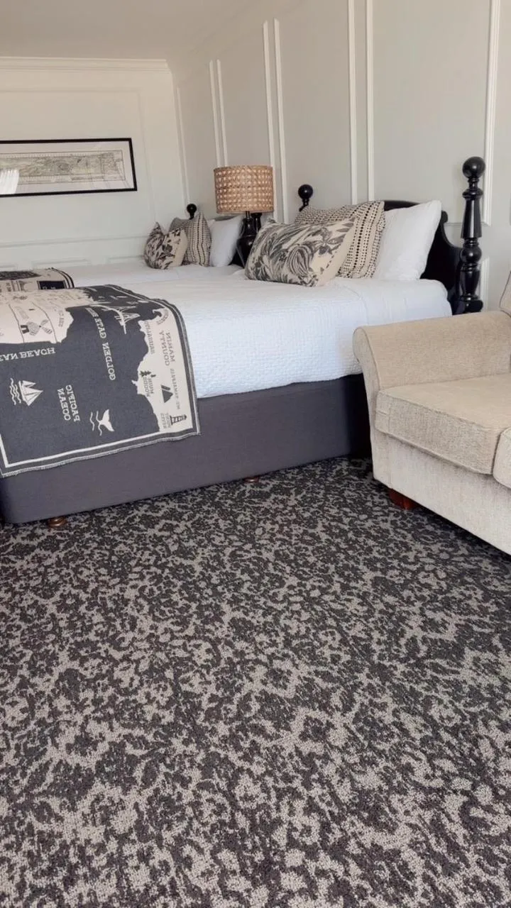 Bed in Cow Hollow Inn and Suites