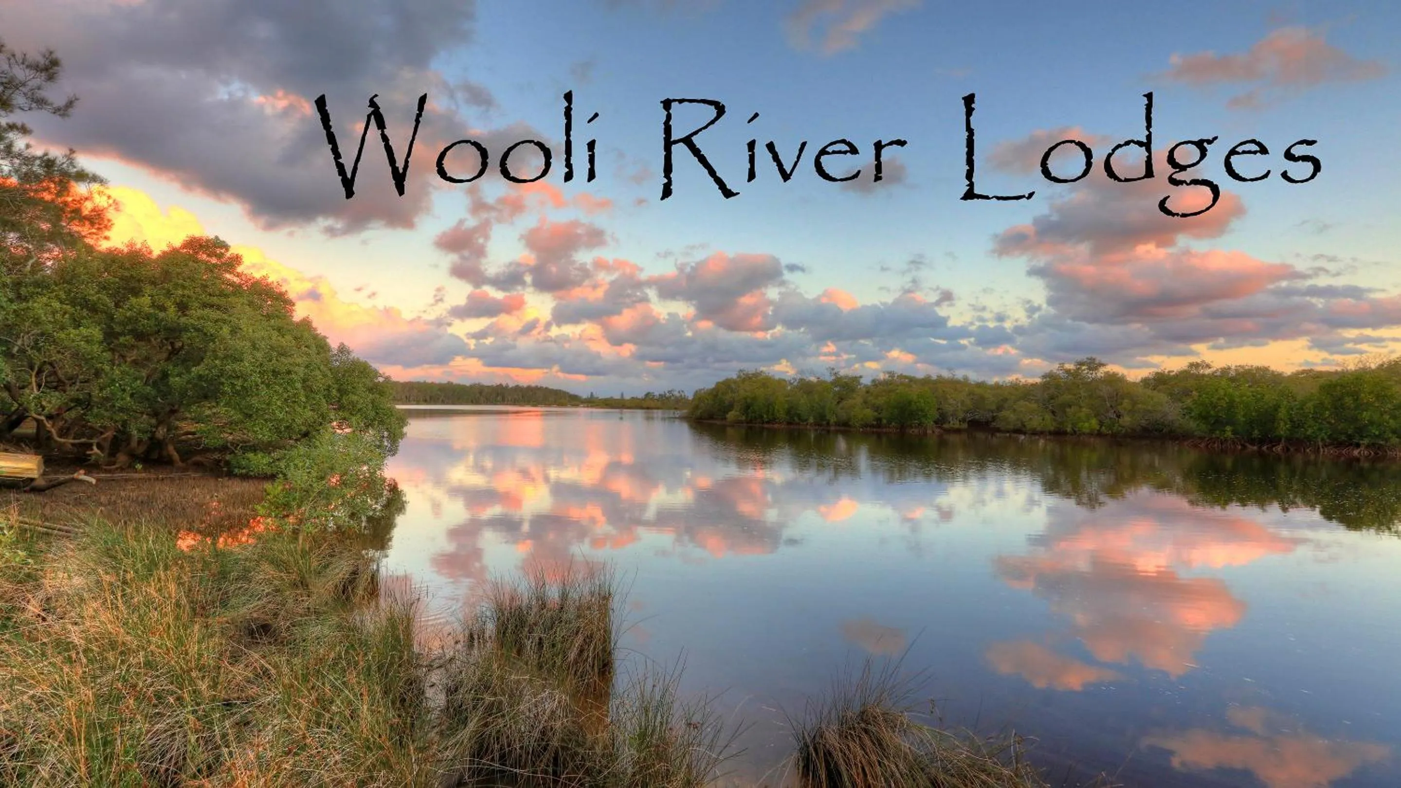 Property logo or sign in Wooli River Lodges